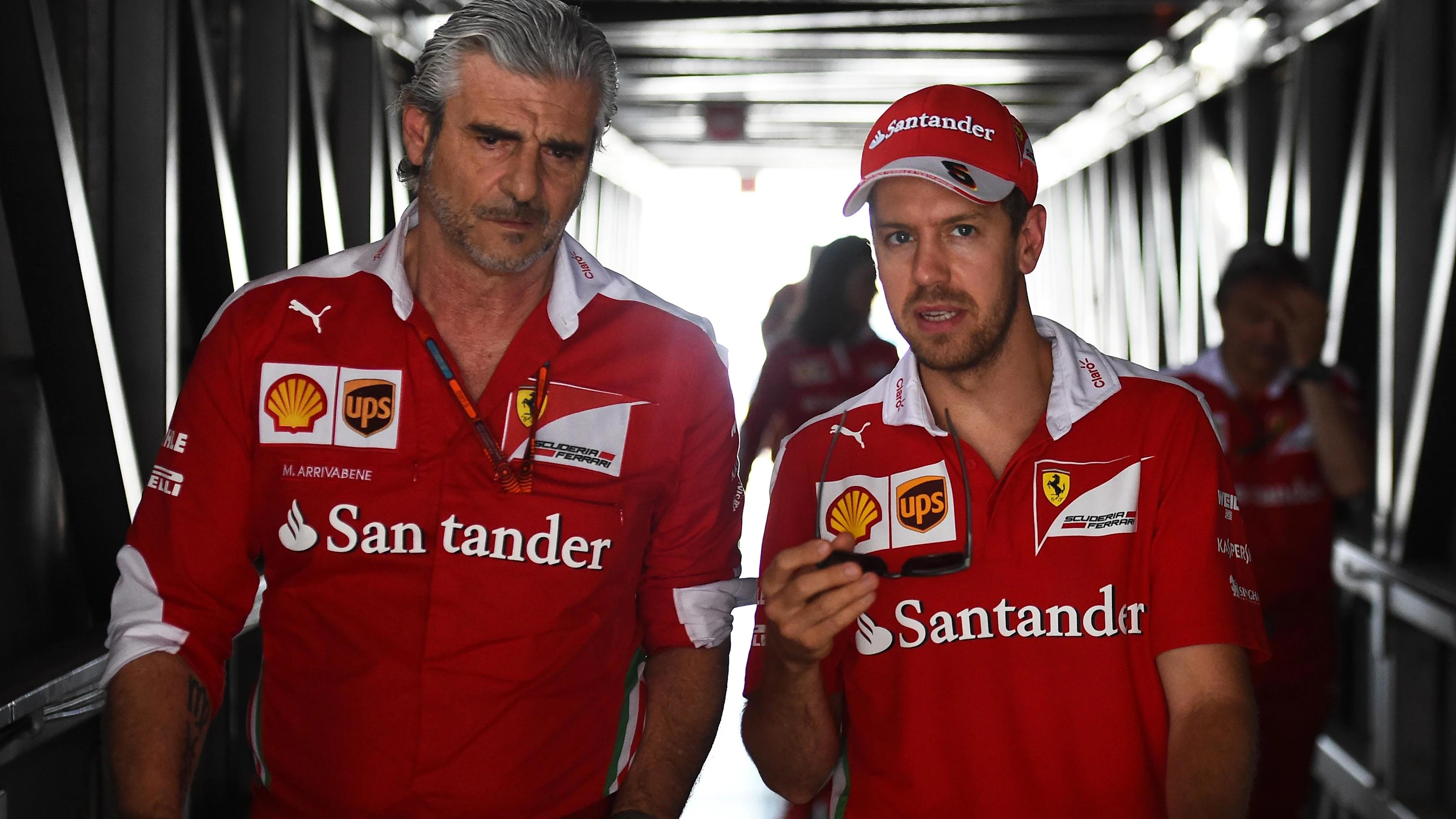 Maurizio Arrivabene (ITA) Ferrari Team Principal and Sebastian Vettel (GER) Ferrari at Formula One