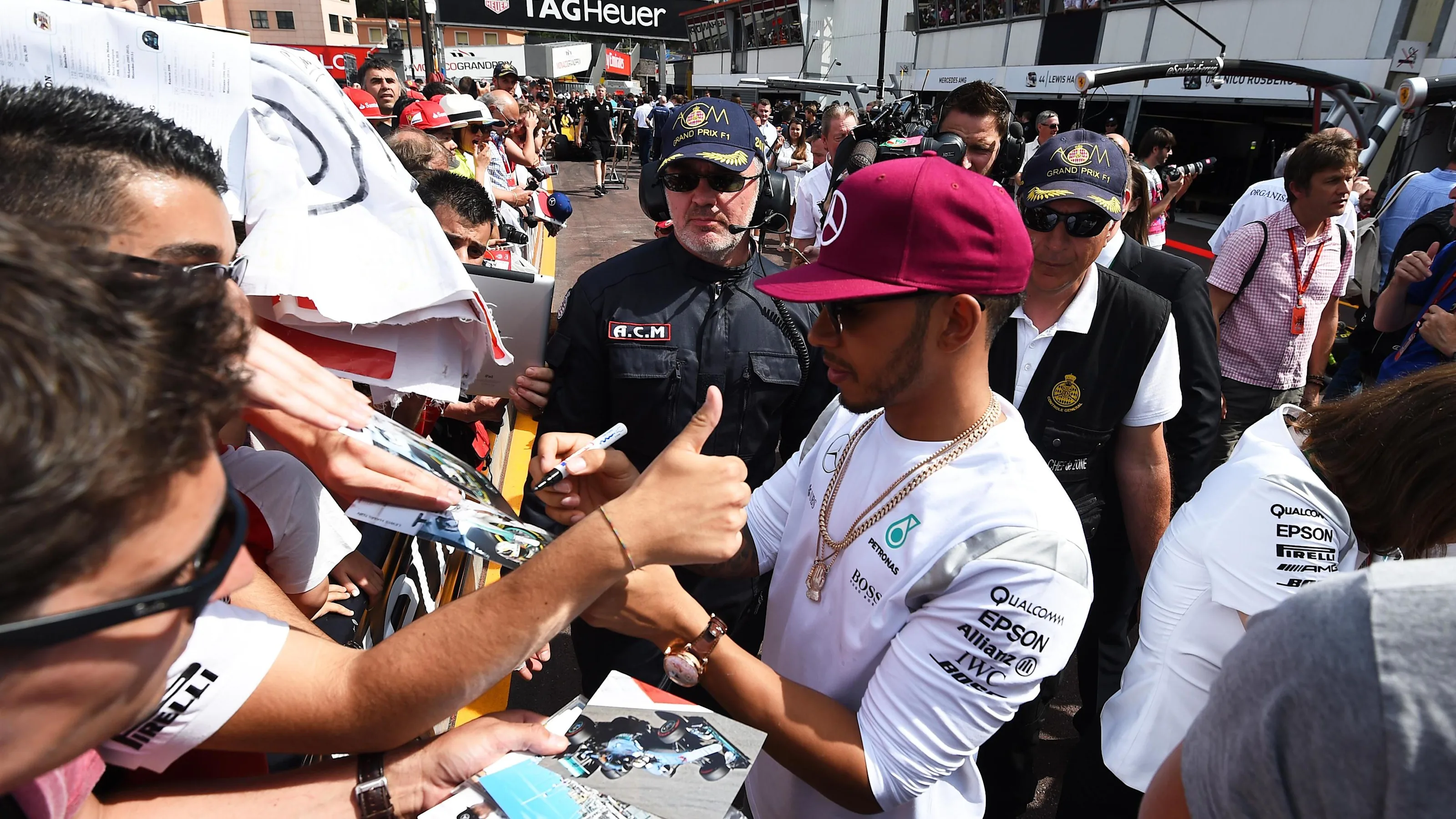 Lewis Hamilton (GBR) Mercedes AMG F1 signs autographs for the fans at Formula One World
