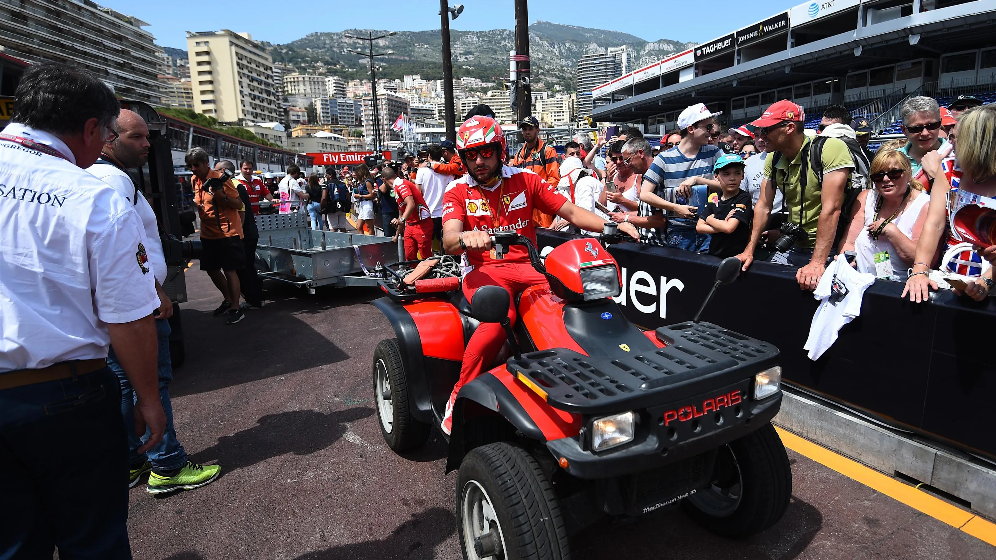 Ferrari mechanics on a quad bike at Formula One World Championship, Rd6, Monaco Grand Prix,