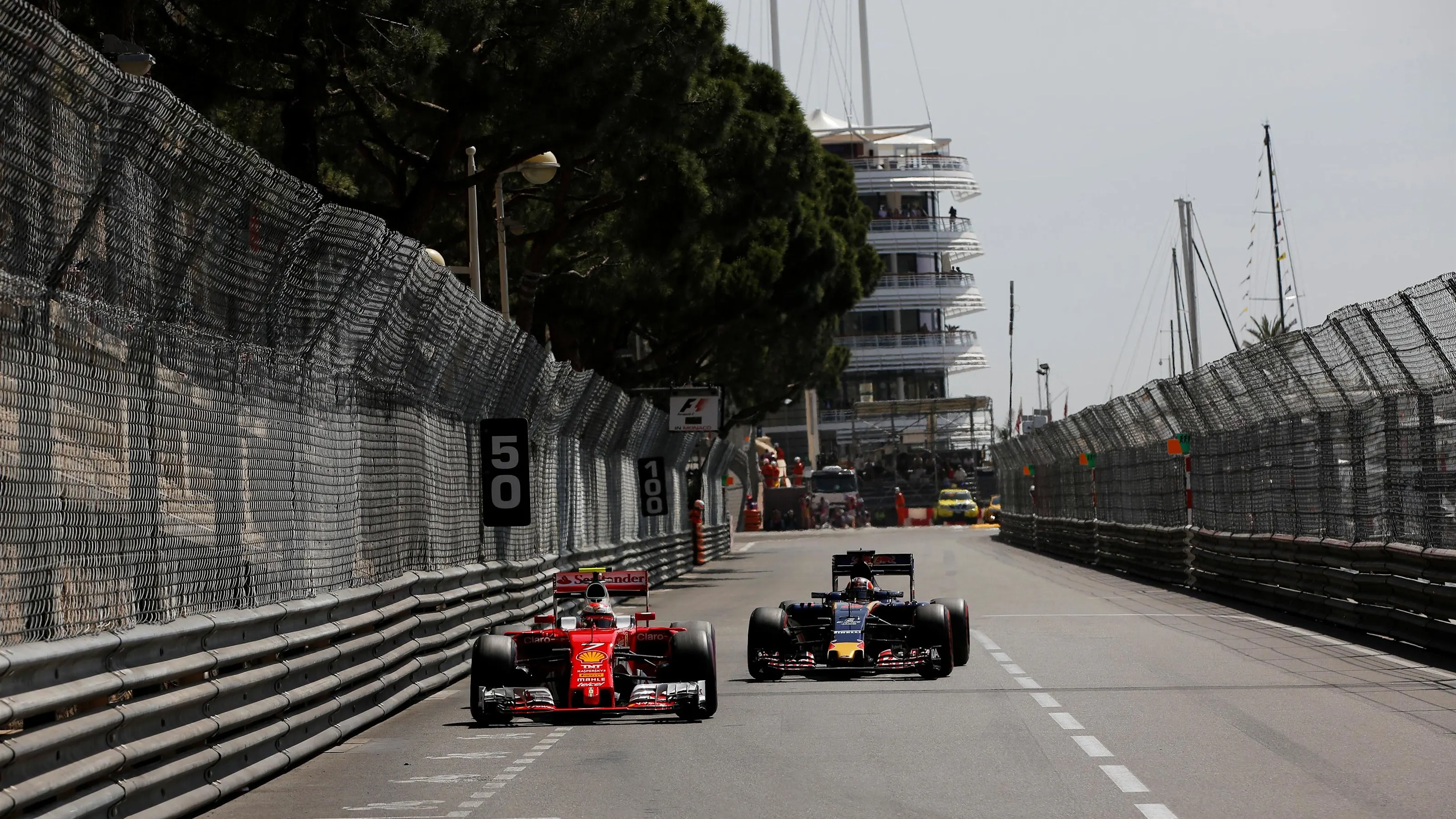 Kimi Raikkonen (FIN) Ferrari SF16-H and Daniil Kvyat (RUS) Scuderia Toro Rosso STR11 at Formula One