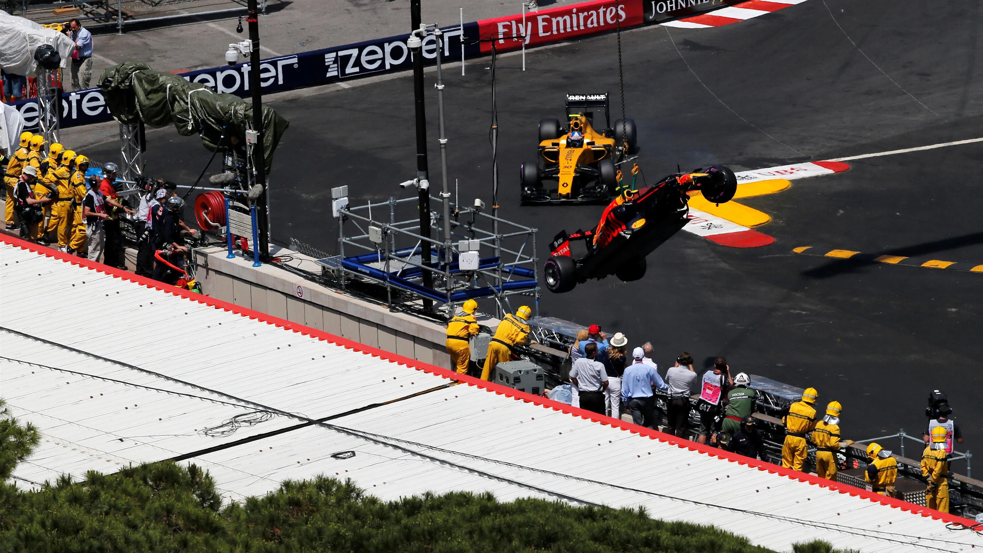 The crashed car of Max Verstappen (NED) Red Bull Racing RB12 is recovered in Q1 at Formula One