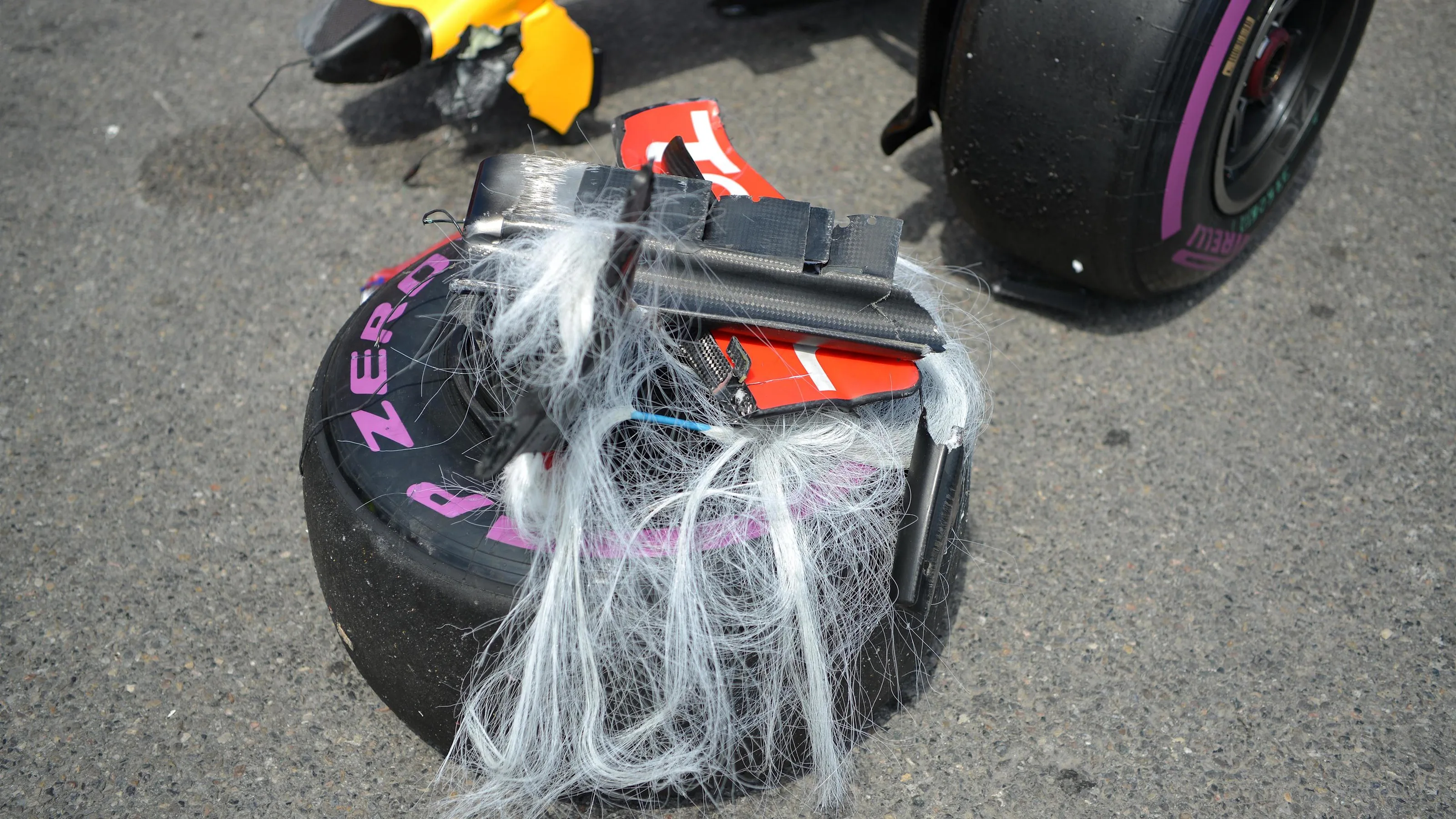 The car and wheel and wheel tether of Max Verstappen (NED) Red Bull Racing RB12 following his crash