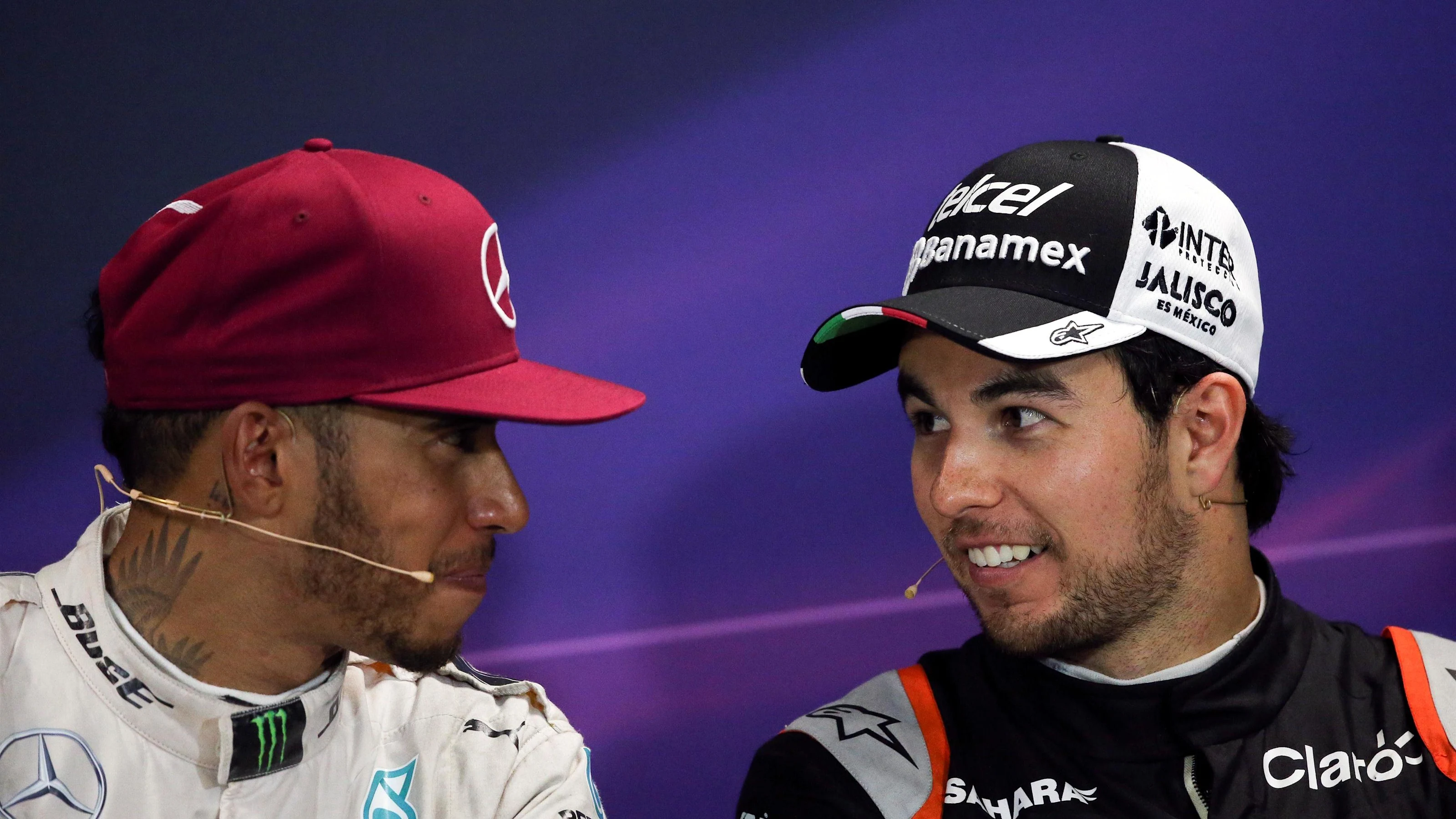 Lewis Hamilton (GBR) Mercedes AMG F1 and Sergio Perez (MEX) Force India in the Press Conference at