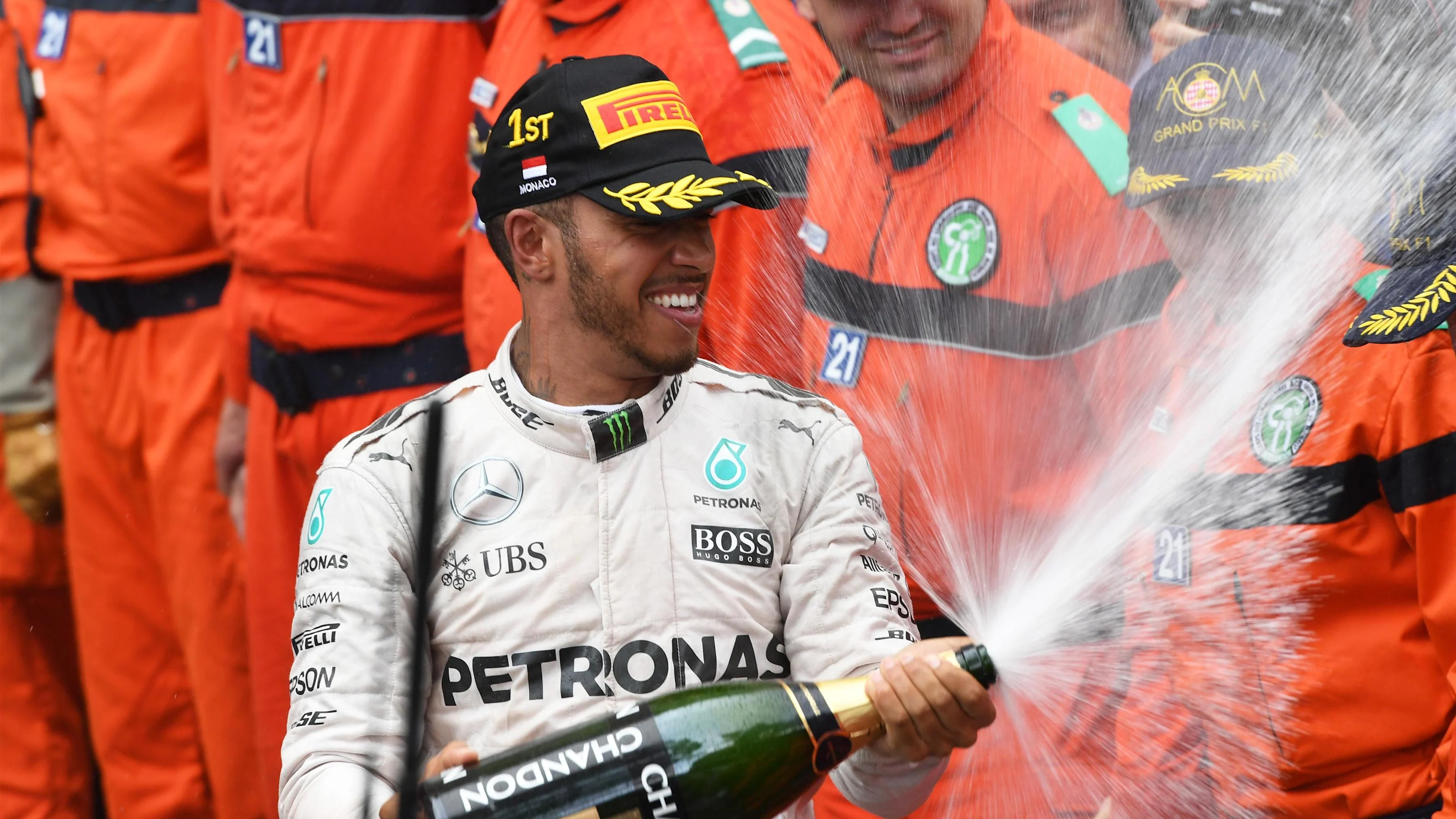 Race winner Lewis Hamilton (GBR) Mercedes AMG F1 celebrates at the podium with the champagne at