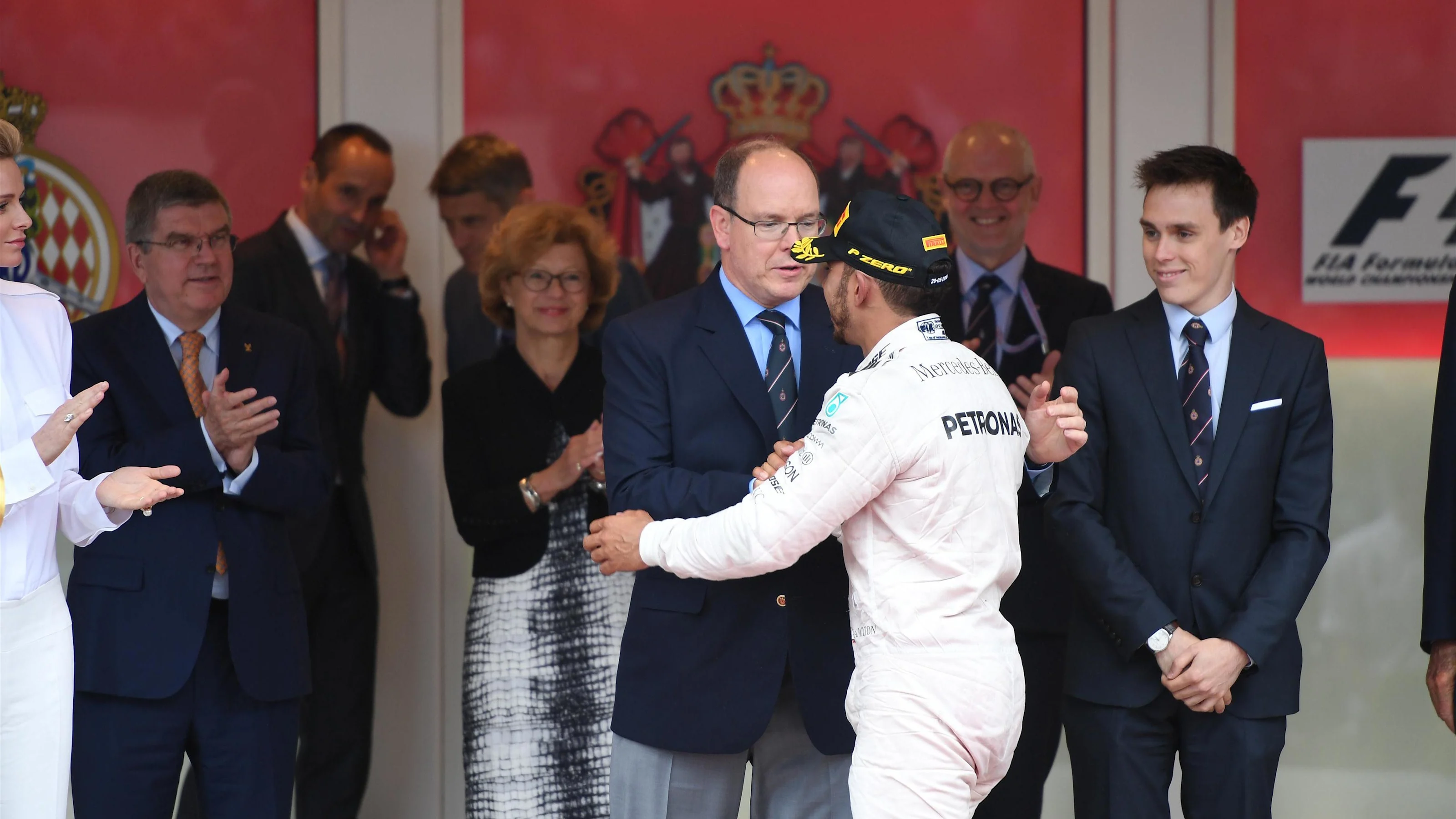 Race winner Lewis Hamilton (GBR) Mercedes AMG F1 celebrates on the podium with HSH Prince Albert of