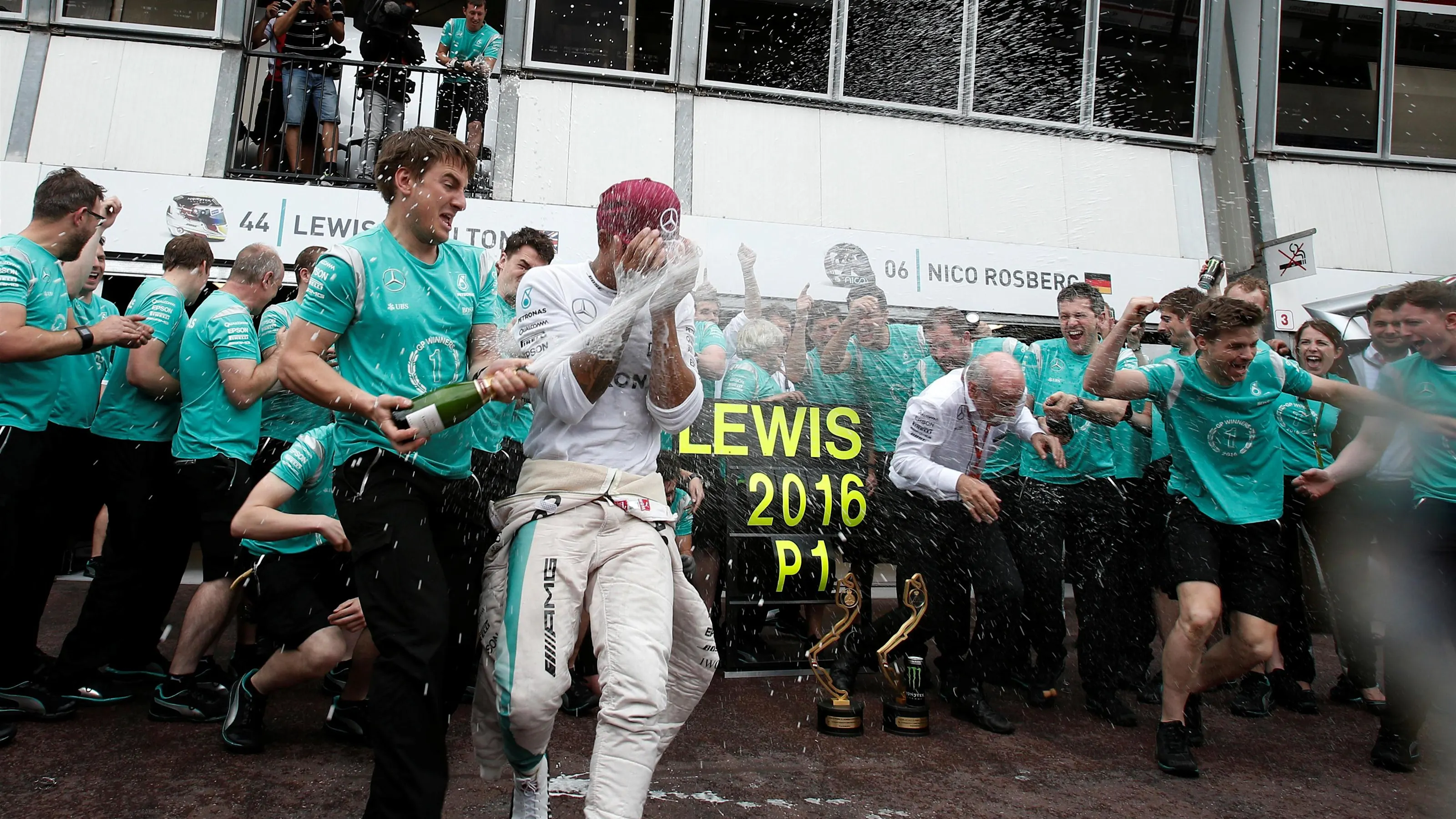 Race winner Lewis Hamilton (GBR) Mercedes AMG F1 celebrates with the team and the champagne at