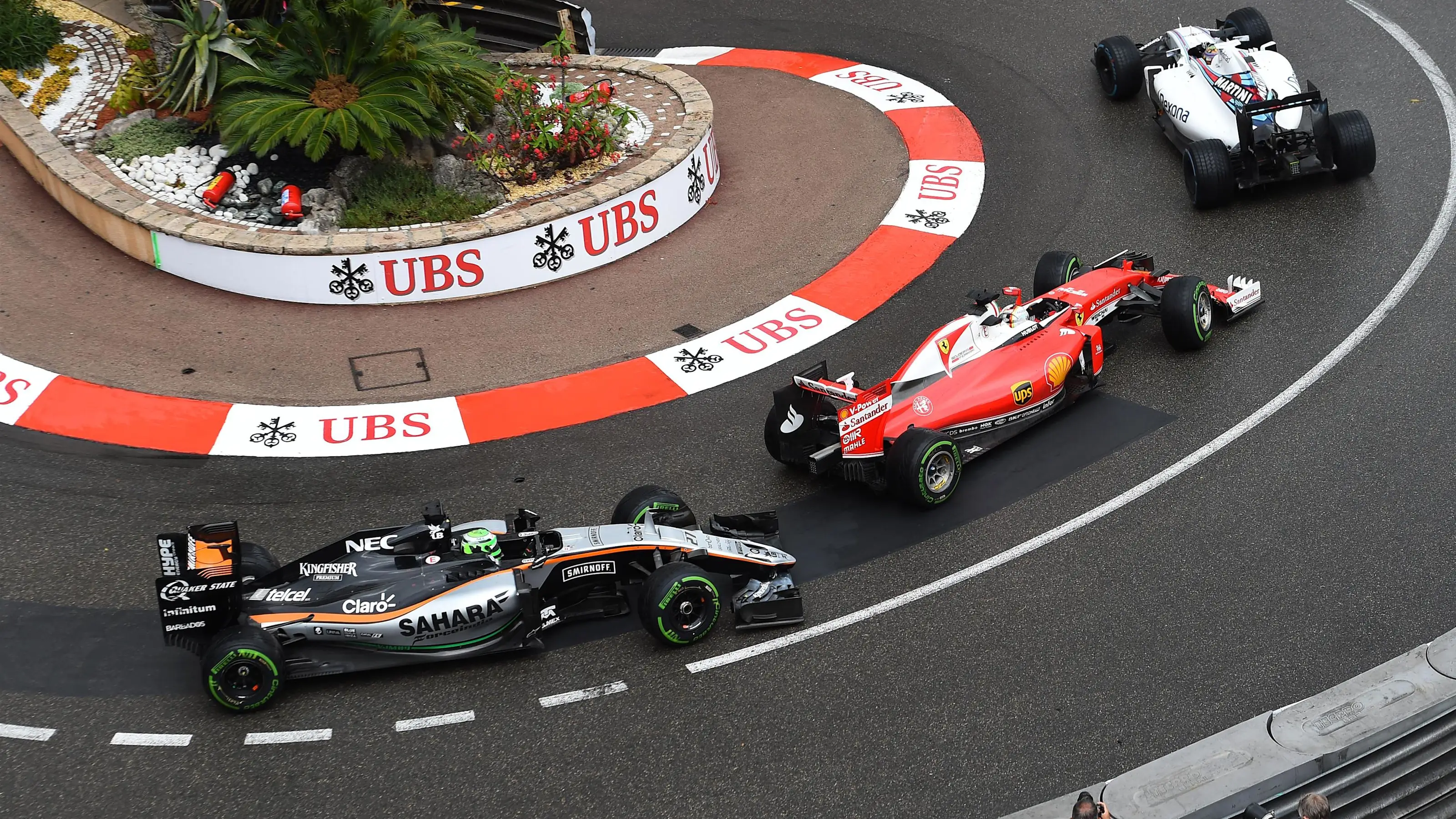 Felipe Massa (BRA) Williams FW38, Sebastian Vettel (GER) Ferrari SF16-H and Nico Hulkenberg (GER)
