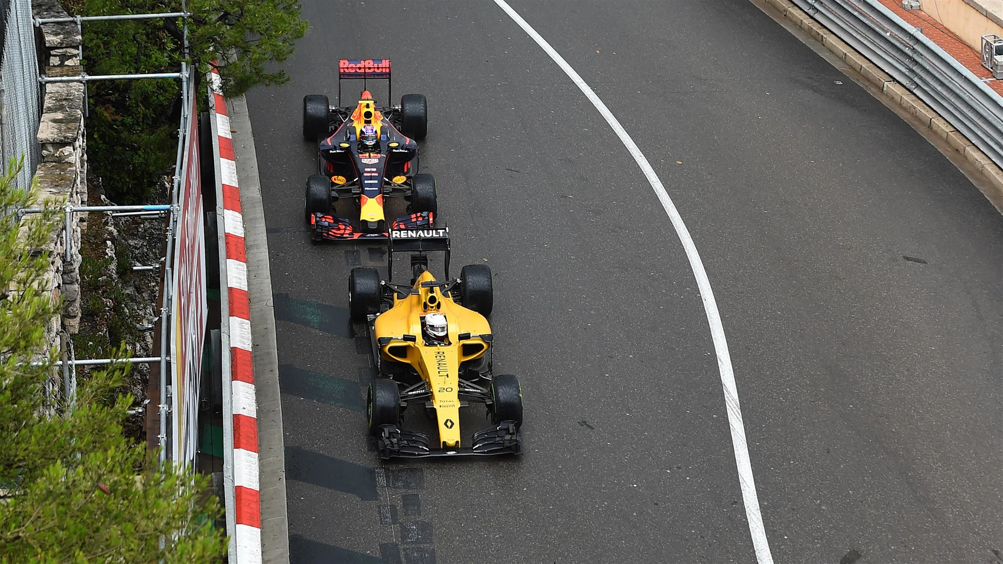 Valtteri Bottas (FIN) Williams FW38 and Kevin Magnussen (DEN) Renault Sport F1 Team RS16 at Formula