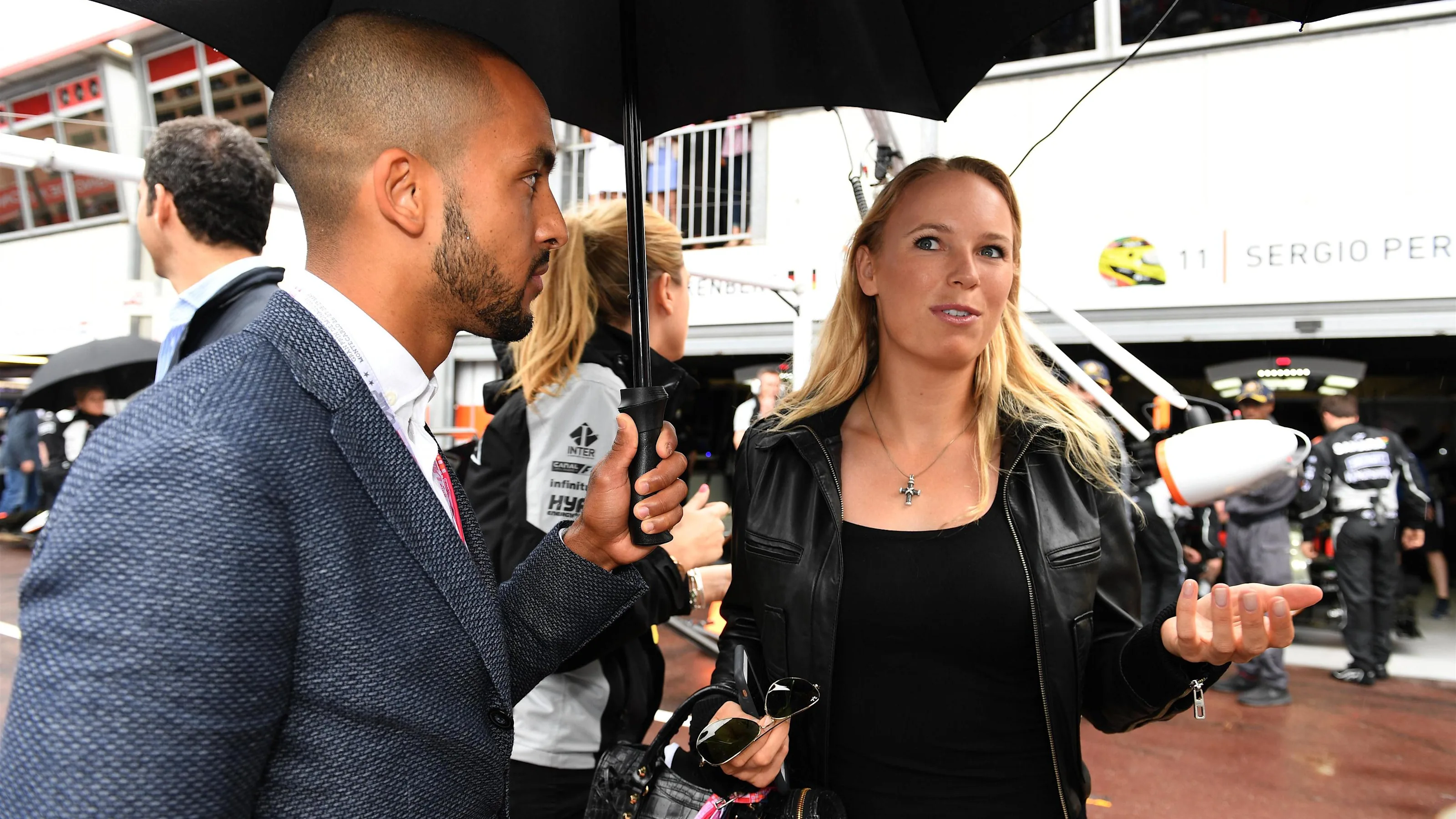 Theo Walcott (GBR) Footballer and Caroline Wozniacki (DEN) Tennis Player at Formula One World
