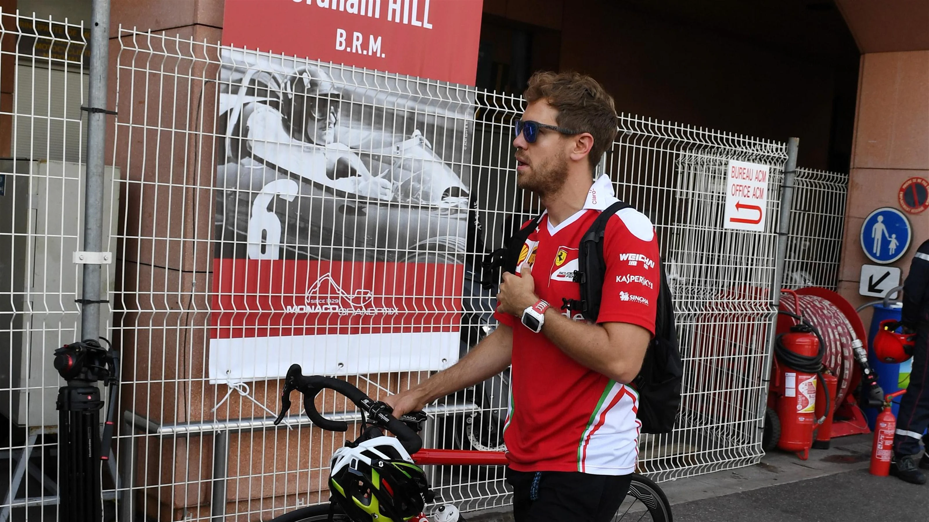 Sebastian Vettel (GER) Ferrari and bike at Formula One World Championship, Rd6, Monaco Grand Prix,