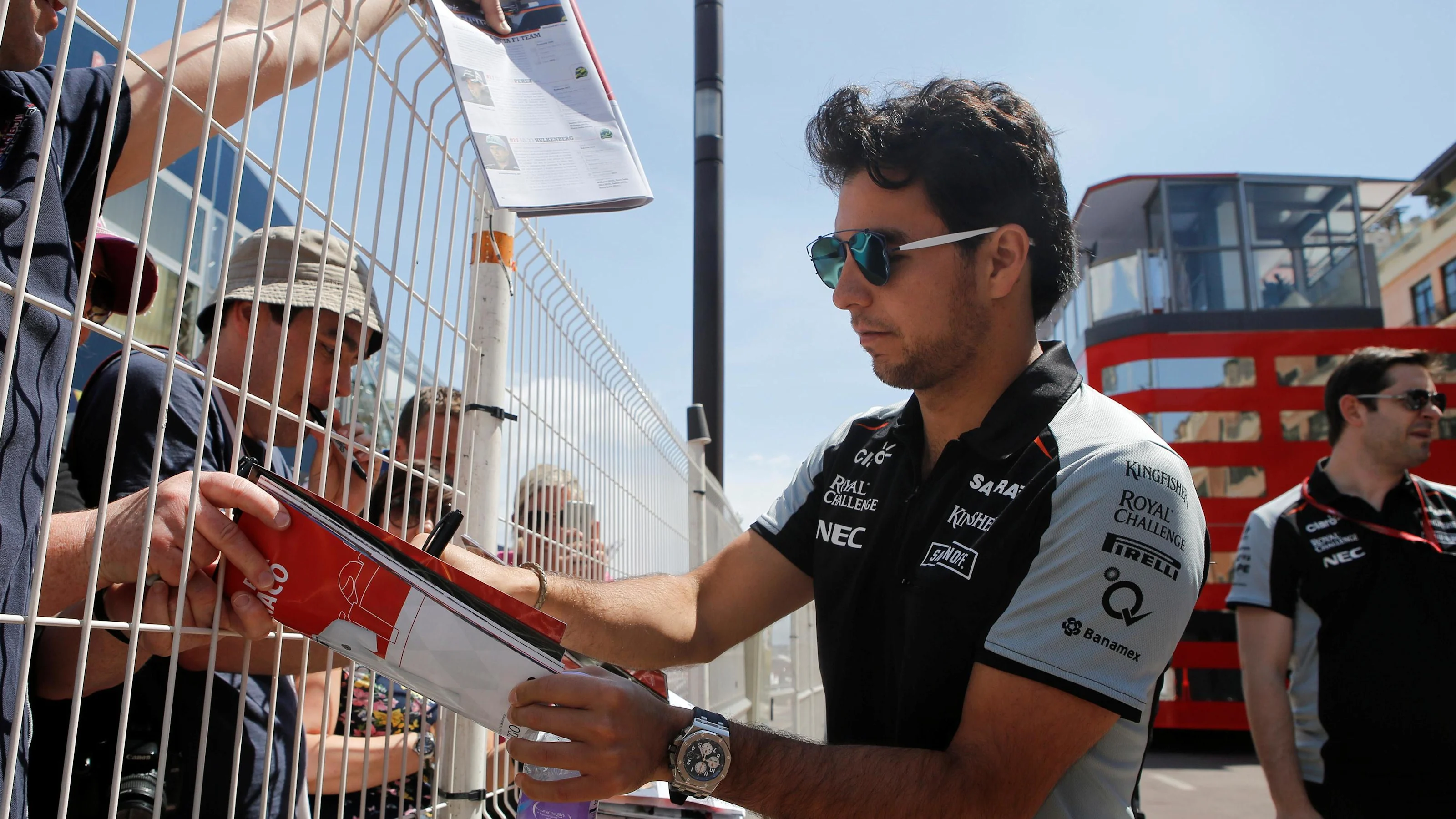 Sergio Perez (MEX) Force India signs autographs for the fans at Formula One World Championship,