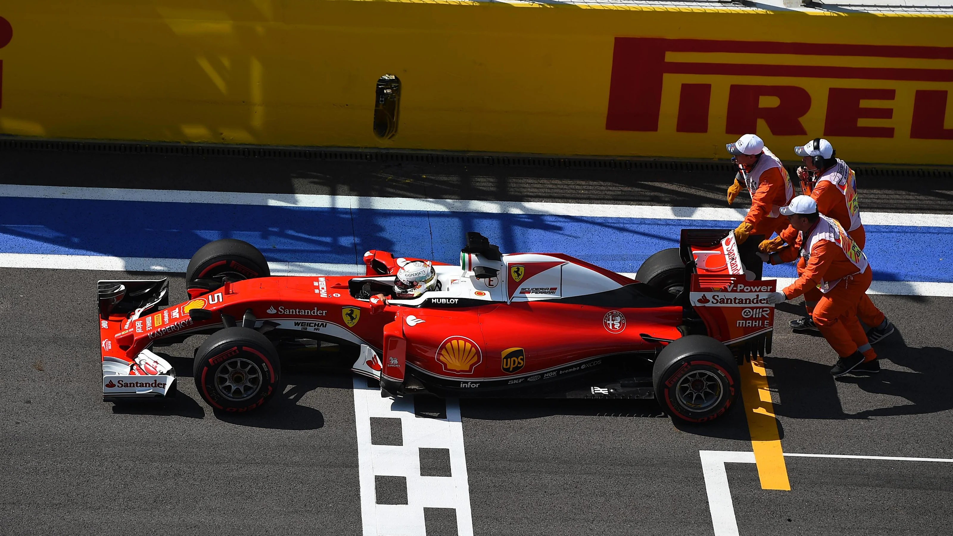 The car of Sebastian Vettel (GER) Ferrari SF16-H is pushed by the marshals in FP2 at Formula One