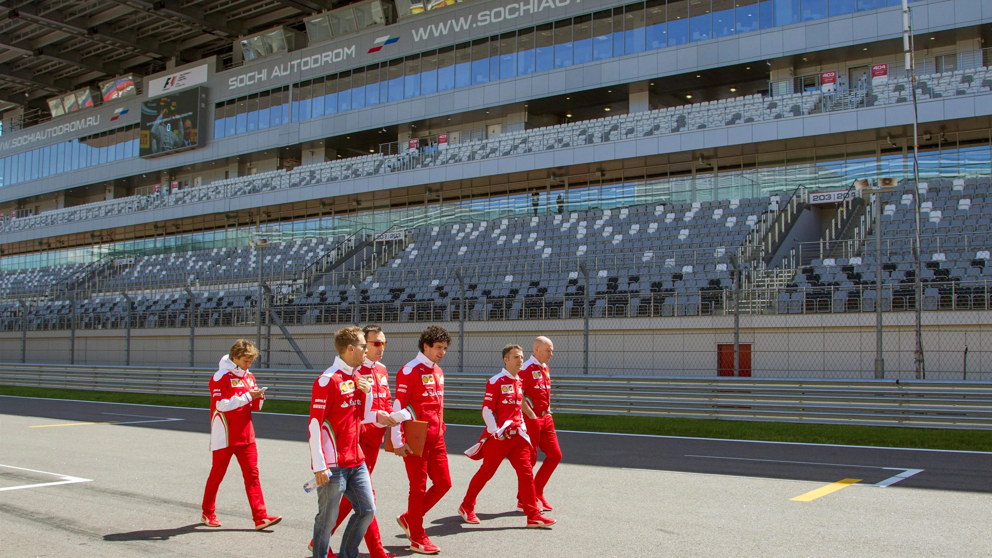 Sebastian Vettel (GER) Ferrari walks the track with Riccardo Adami (ITA) Ferrari Race Engineer and