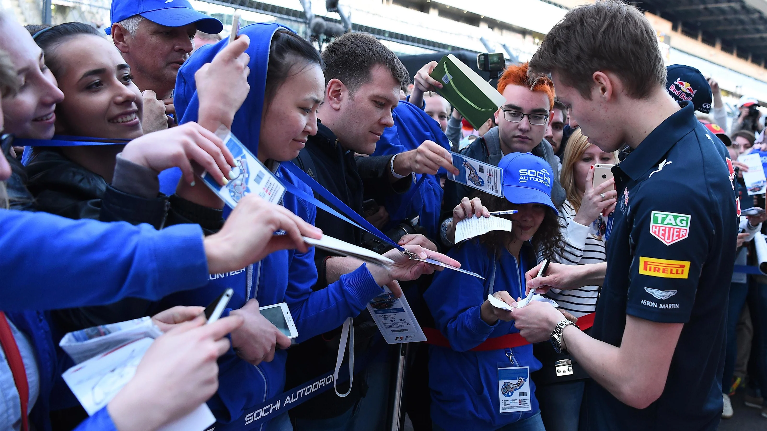 Daniil Kvyat (RUS) Red Bull Racing signs autographs for the fans at Formula One World Championship,
