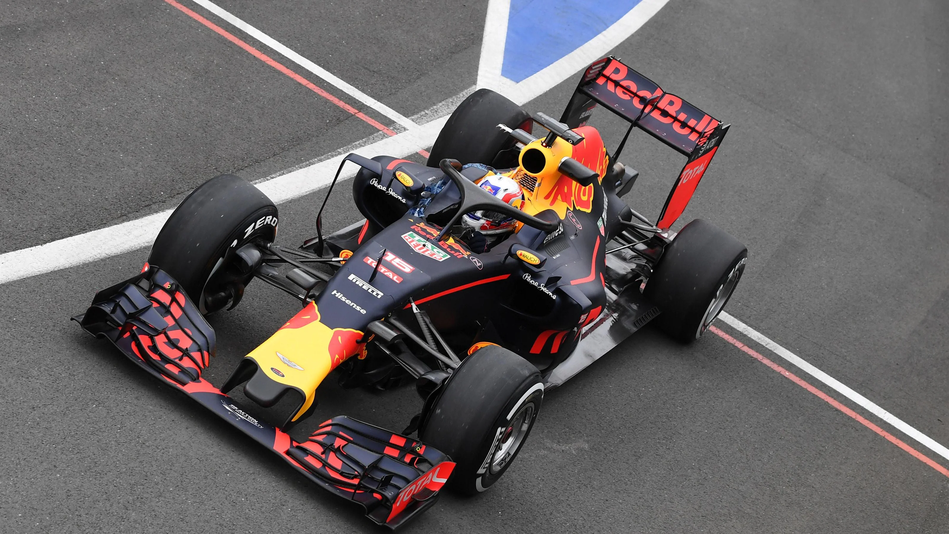 Pierre Gasly (FRA) Red Bull Racing RB12 with halo at Formula One Testing, Day One, Silverstone,