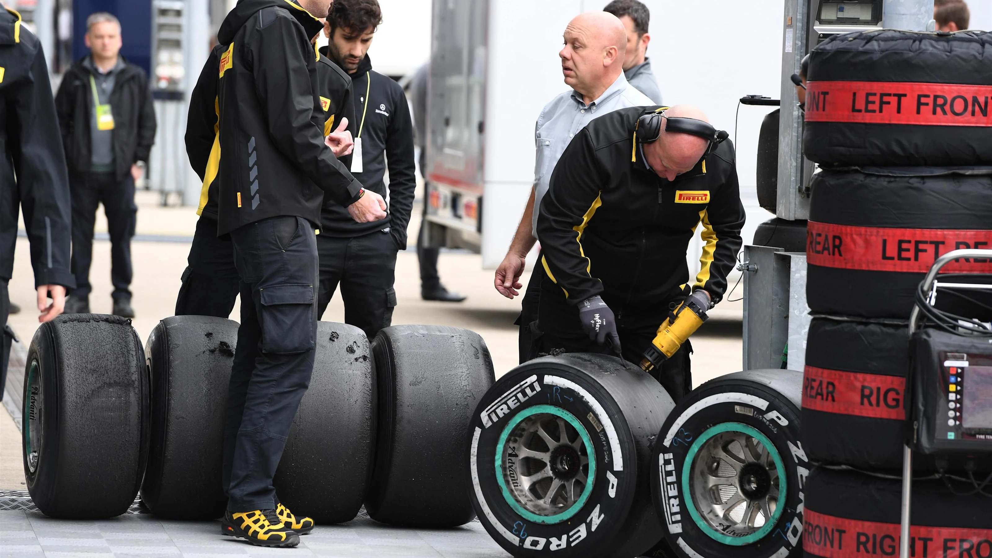 Pirelli engineers and Pirelli tyres at Formula One Testing, Day One, Silverstone, England, Tuesday