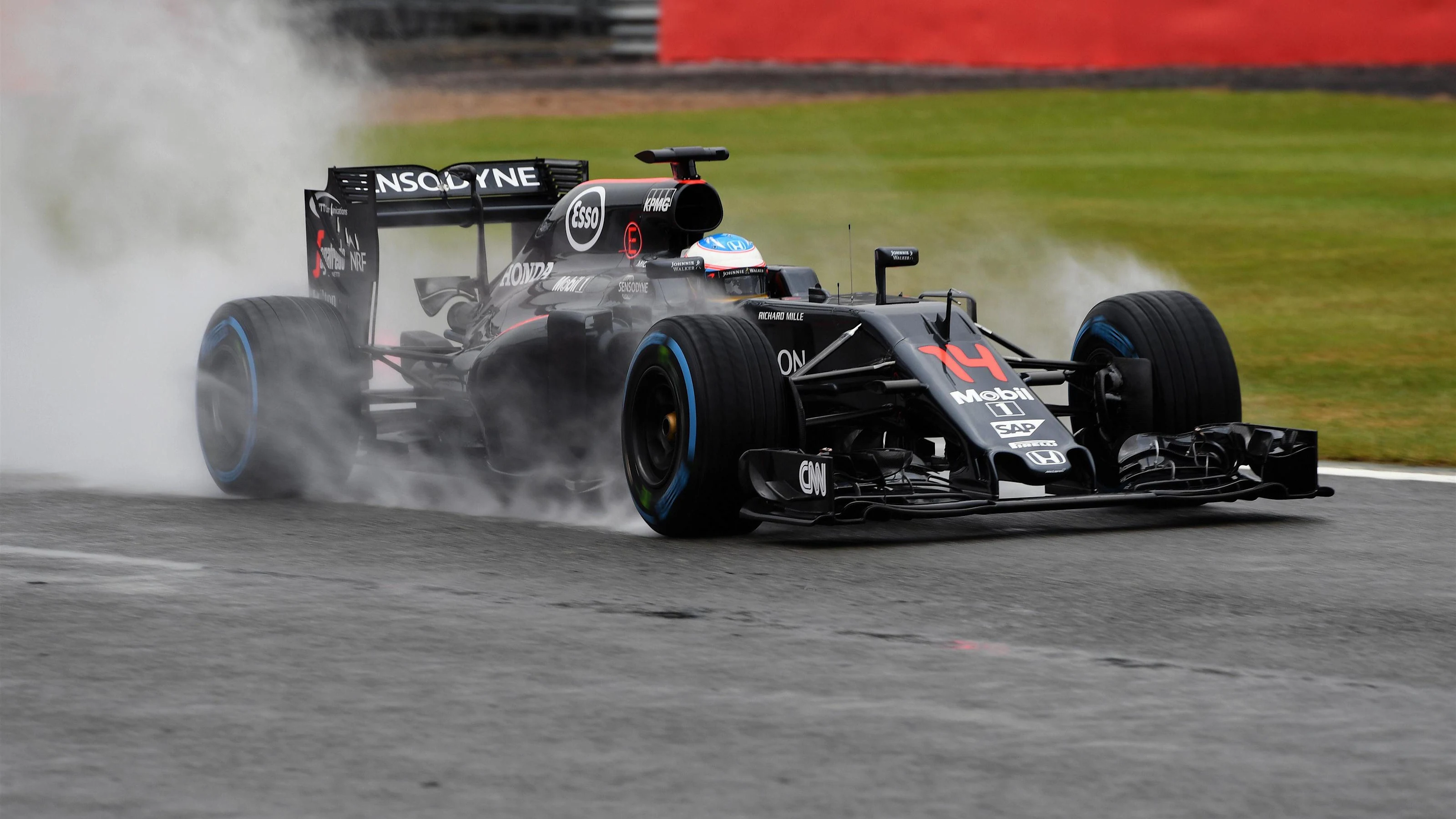 Fernando Alonso (ESP) McLaren MP4-31 at Formula One Testing, Day One, Silverstone, England, Tuesday