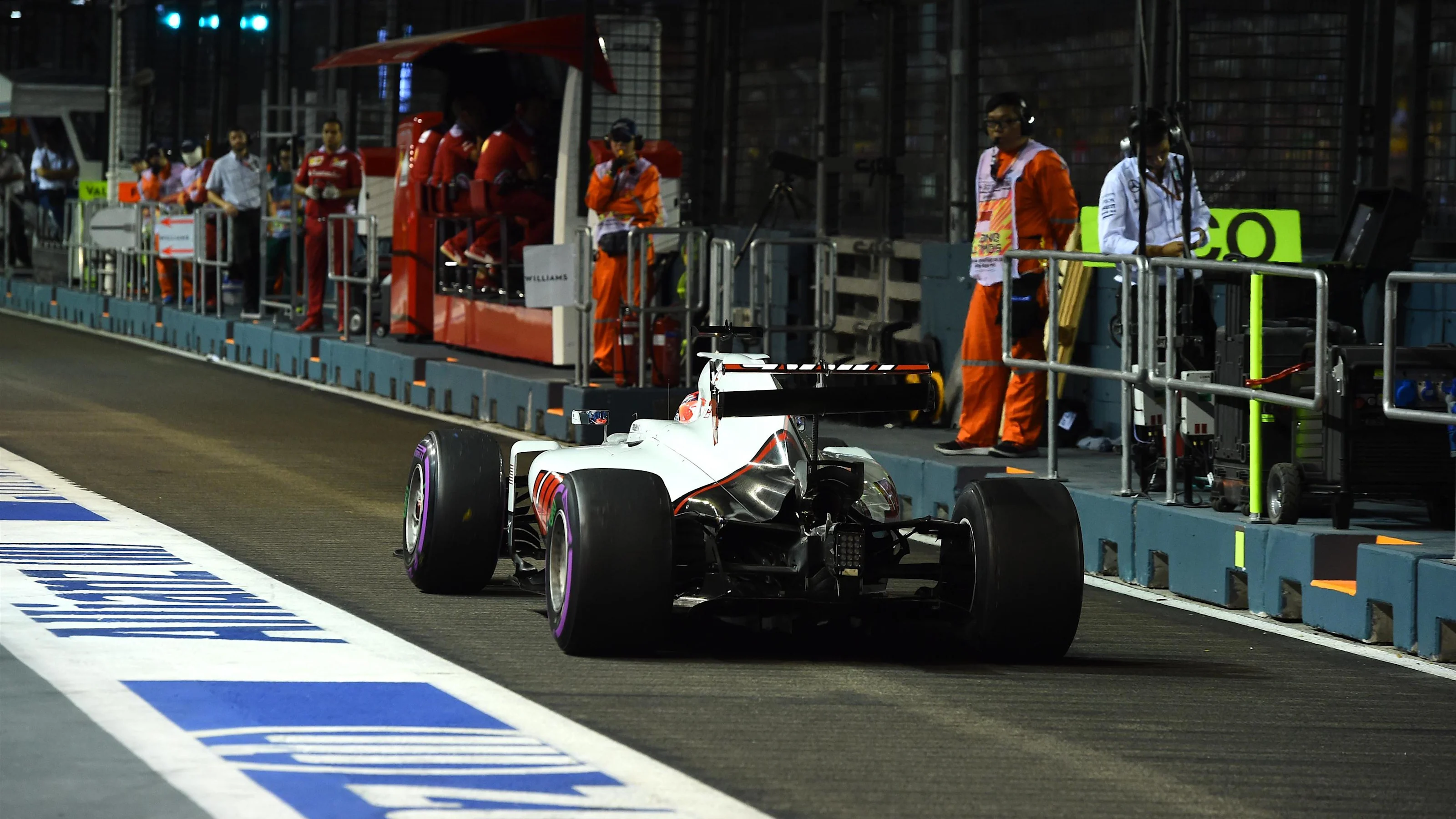 Romain Grosjean (FRA) Haas VF-16 with broken rear wing after hitting the wall in FP2 at Formula One