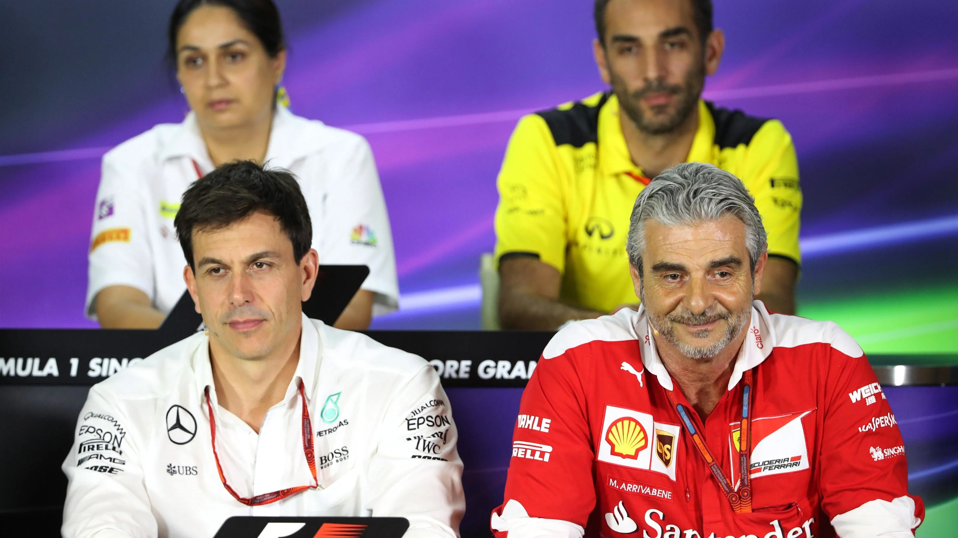 Toto Wolff (AUT) Mercedes AMG F1 Director of Motorsport and Maurizio Arrivabene (ITA) Ferrari Team