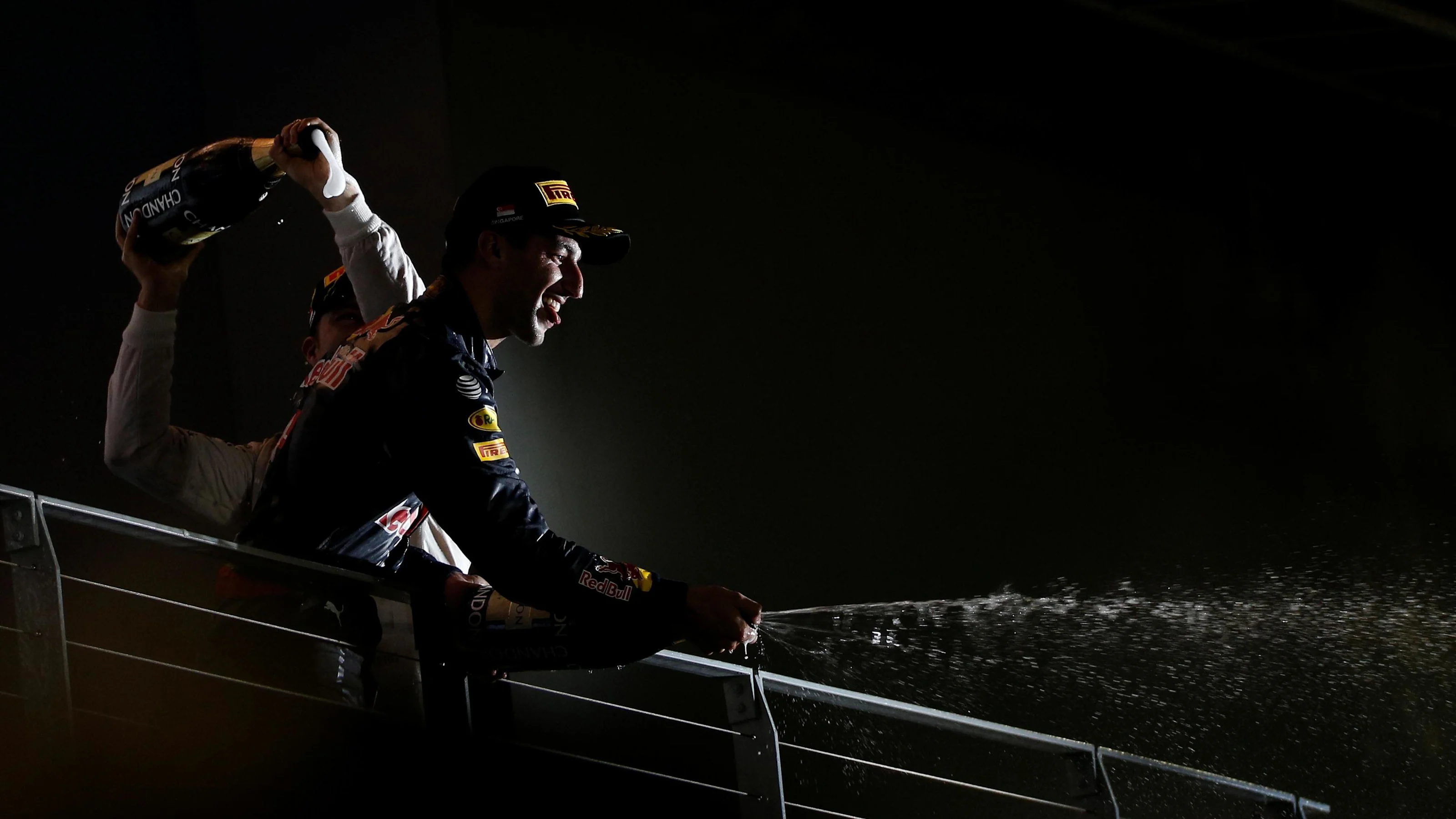 Race winner Nico Rosberg (GER) Mercedes AMG F1 and Daniel Ricciardo (AUS) Red Bull Racing celebrate