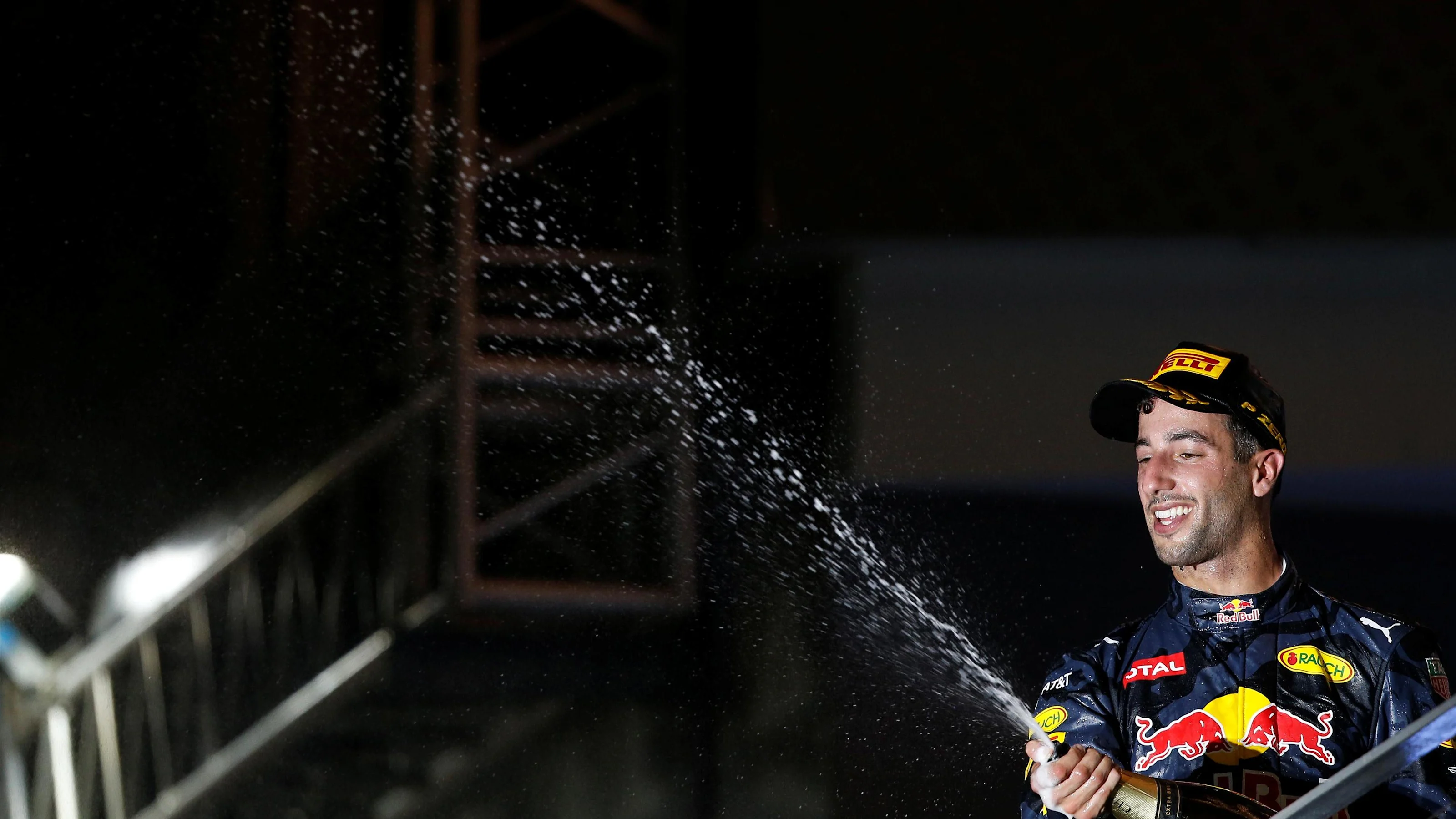 Daniel Ricciardo (AUS) Red Bull Racing celebrates with the champagne on the podium at Formula One