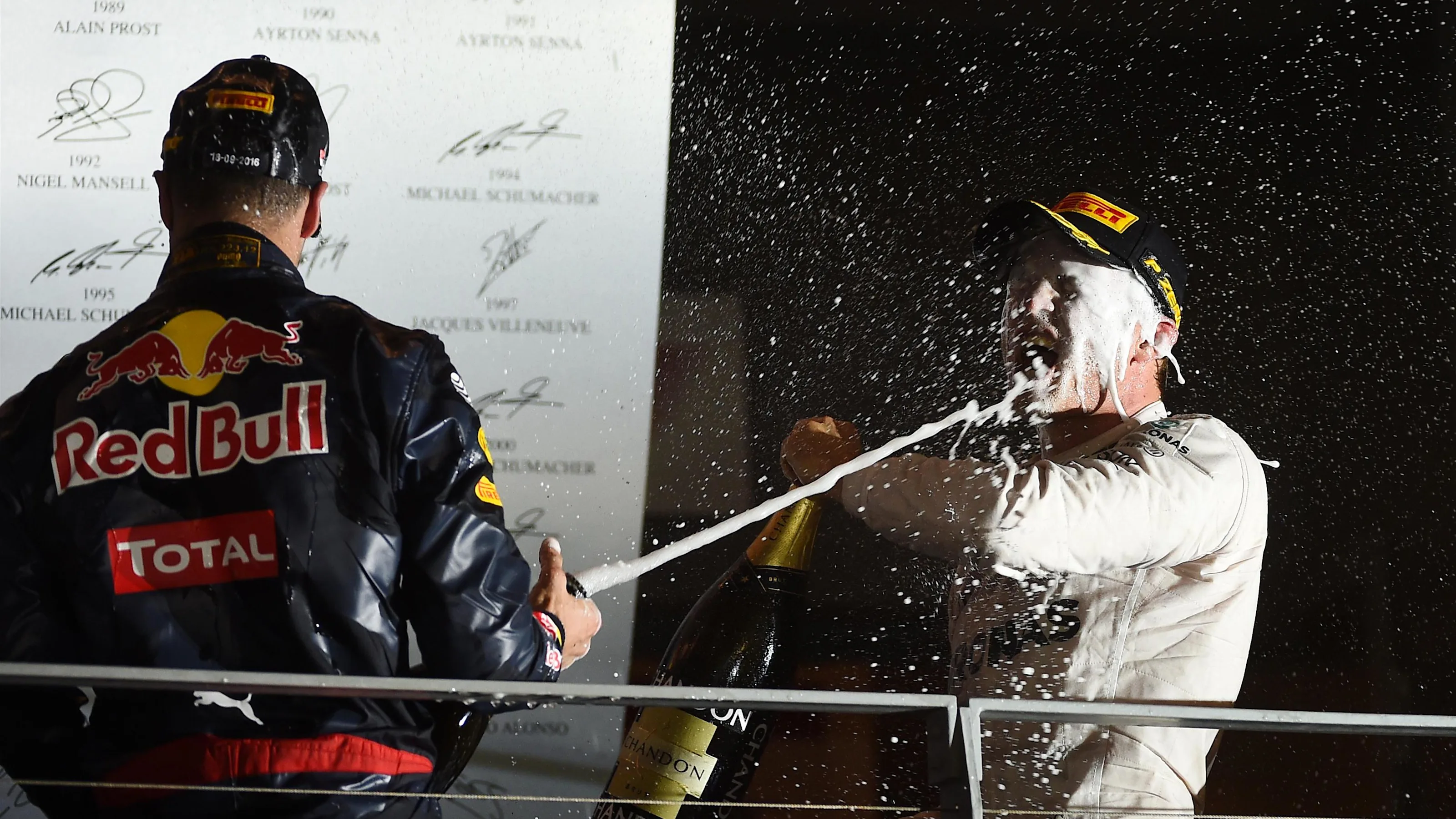 Race winner Nico Rosberg (GER) Mercedes-Benz F1 W07 Hybrid celebrates with Daniel Ricciardo (AUS)