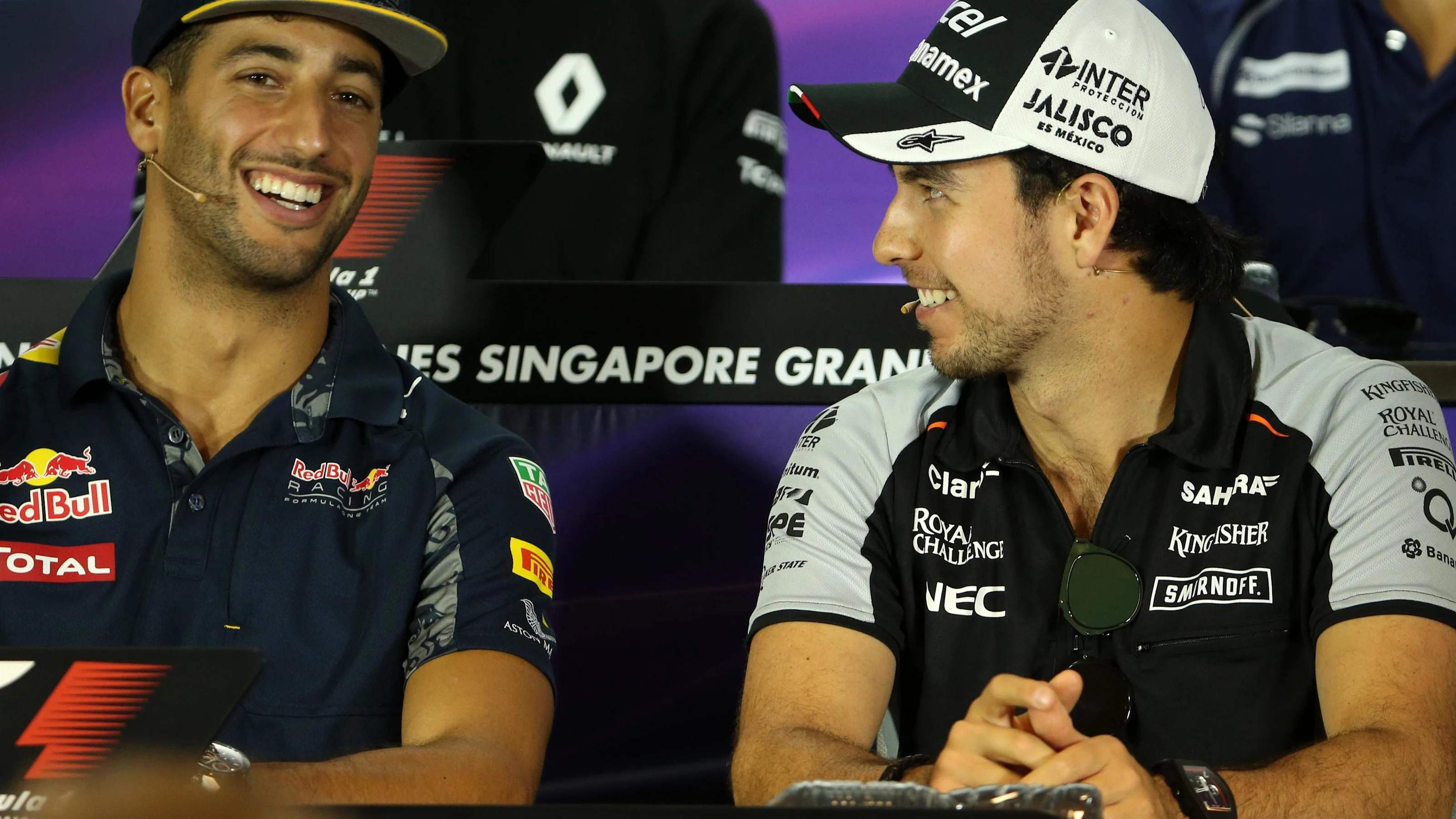 Daniel Ricciardo (AUS) Red Bull Racing and Sergio Perez (MEX) Force India in the Press Conference