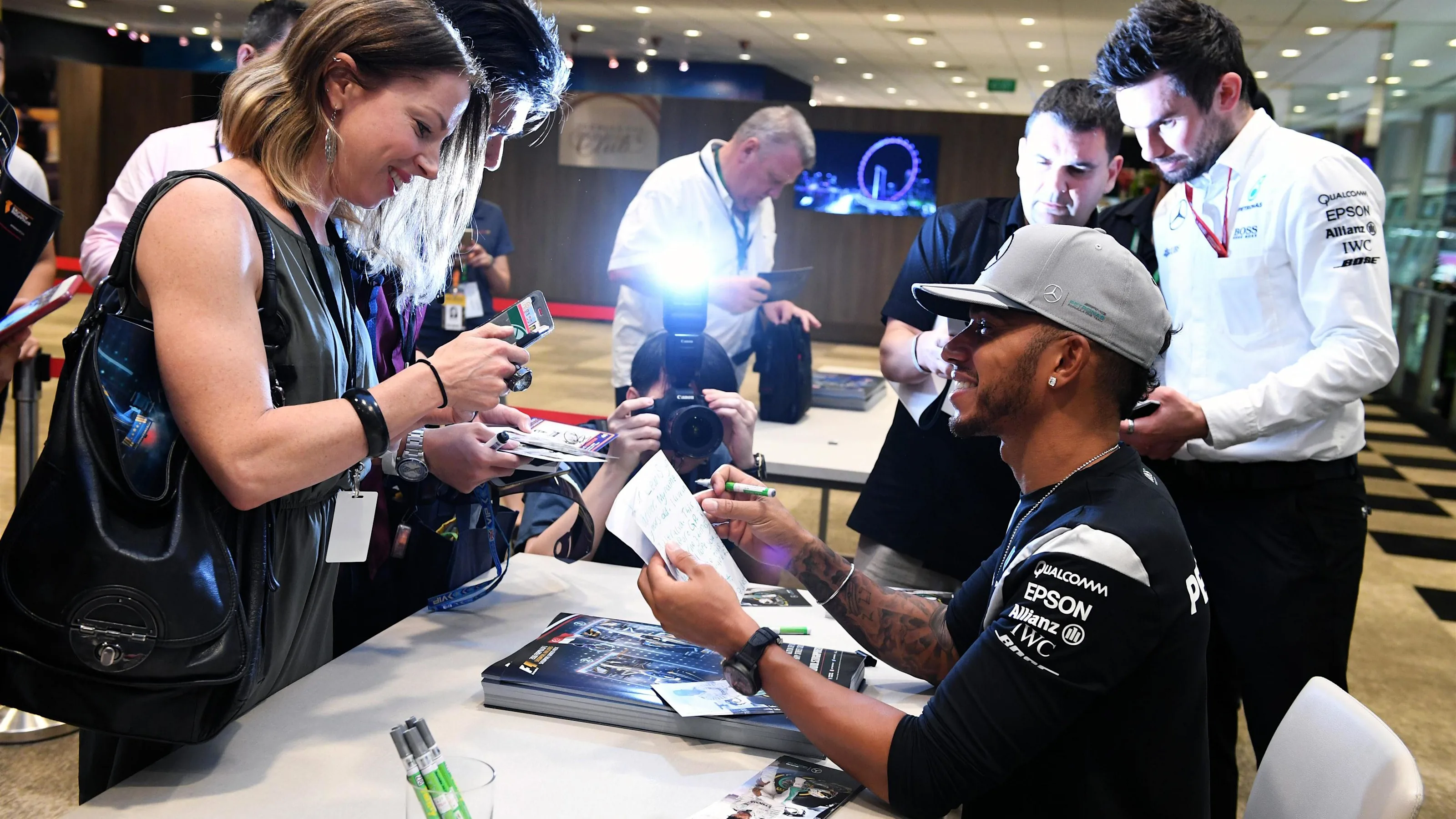 Lewis Hamilton (GBR) Mercedes AMG F1 at the fans autograph session at Formula One World