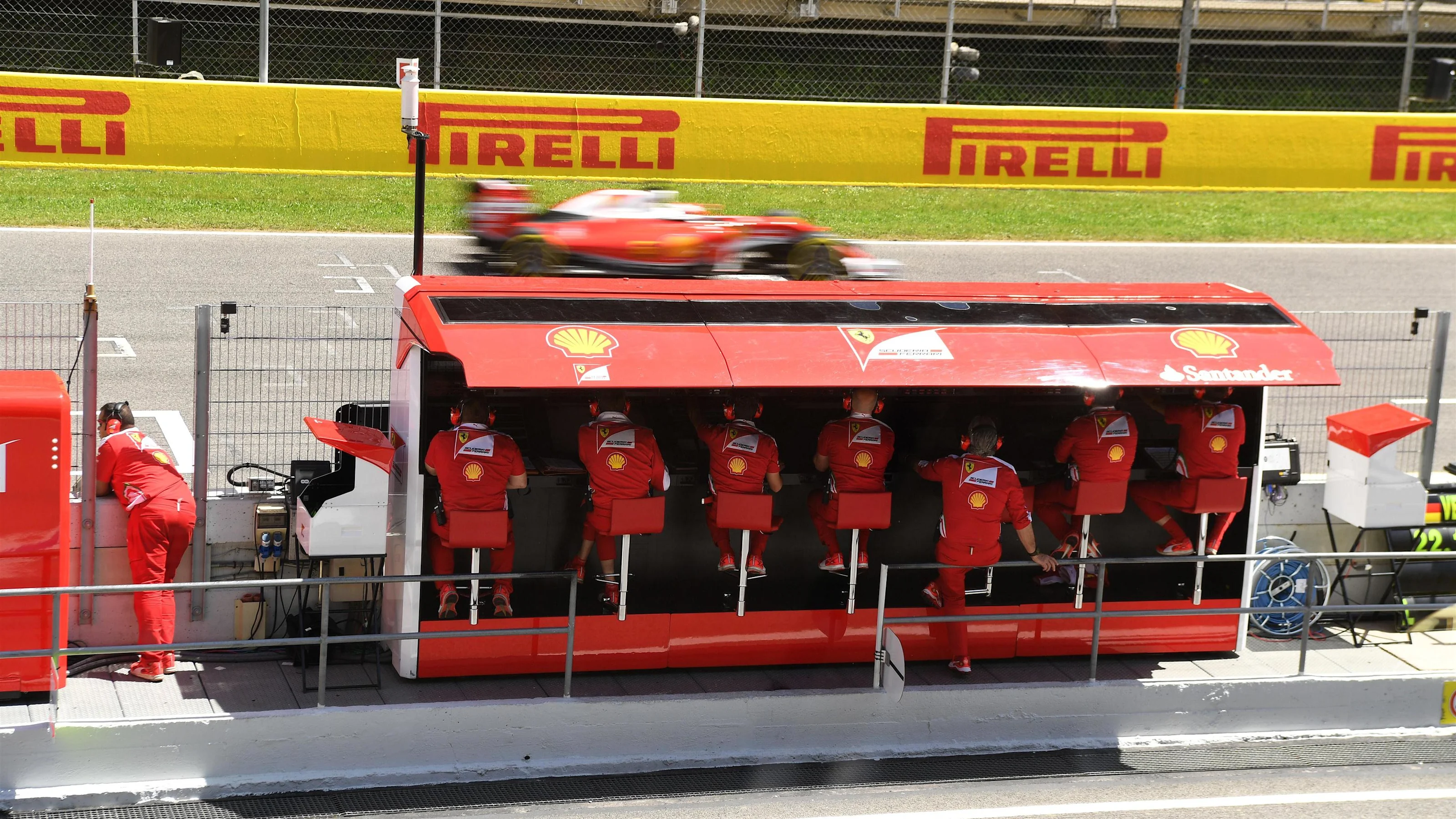 Sebastian Vettel (GER) Ferrari SF16-H passes the Ferrari pit wall gantry at Formula One World
