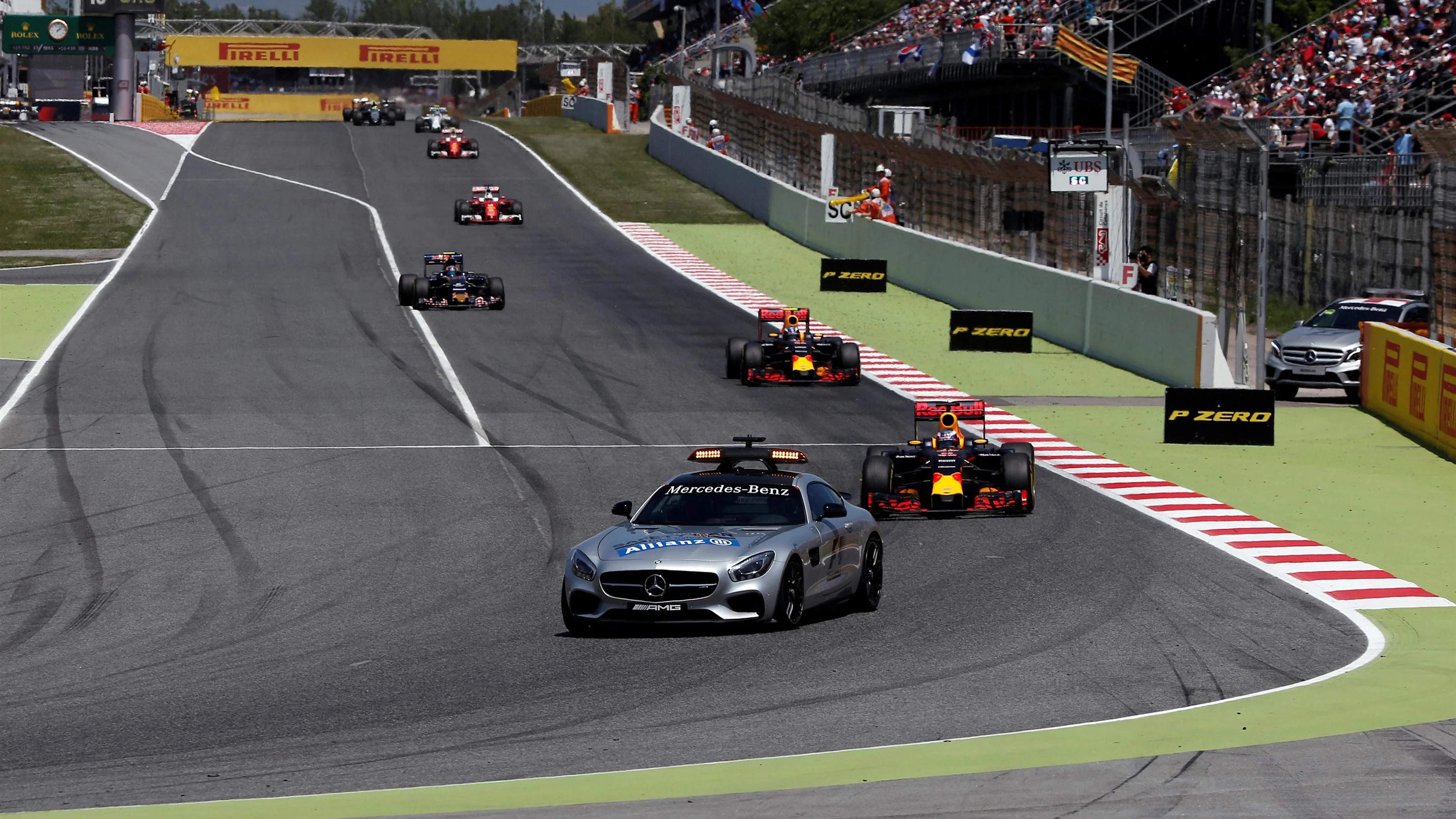 Daniel Ricciardo (AUS) Red Bull Racing RB12 lead out by the Safety Car Formula One World
