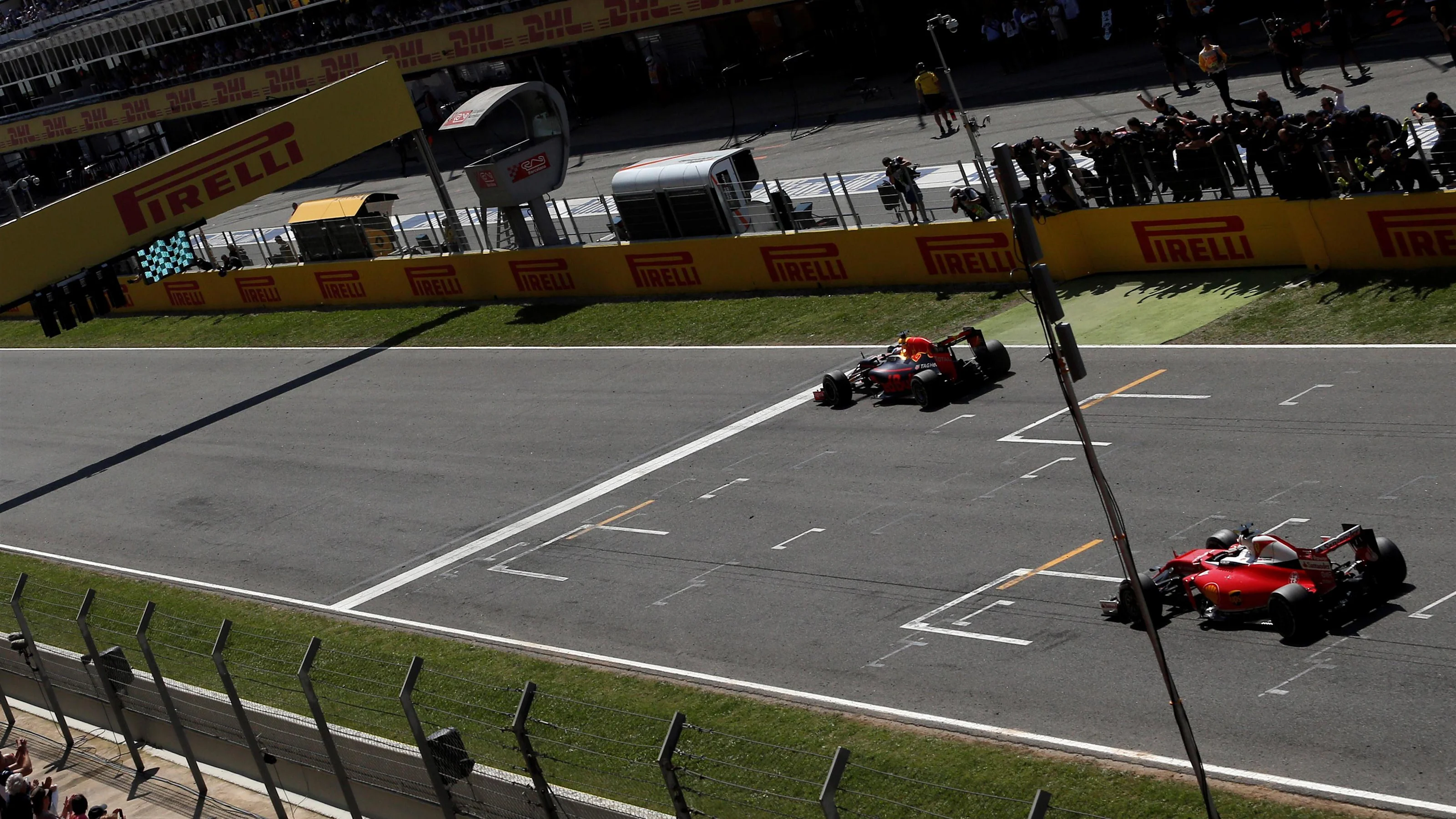 Max Verstappen (NED) Red Bull Racing RB12 crosses the line to take the chequered flag and win the