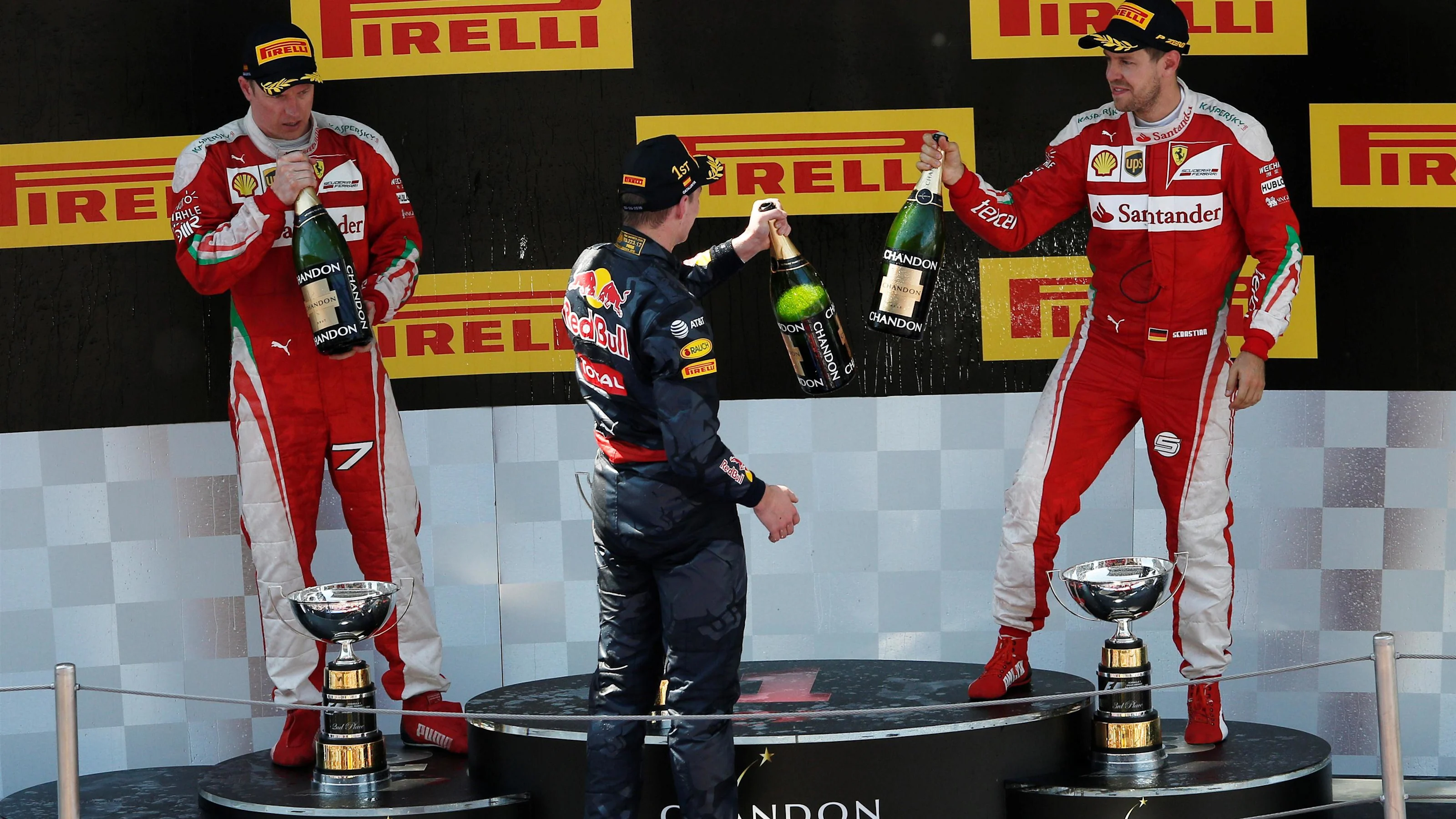 Kimi Raikkonen (FIN) Ferrari, race winner Max Verstappen (NED) Red Bull Racing and Sebastian Vettel