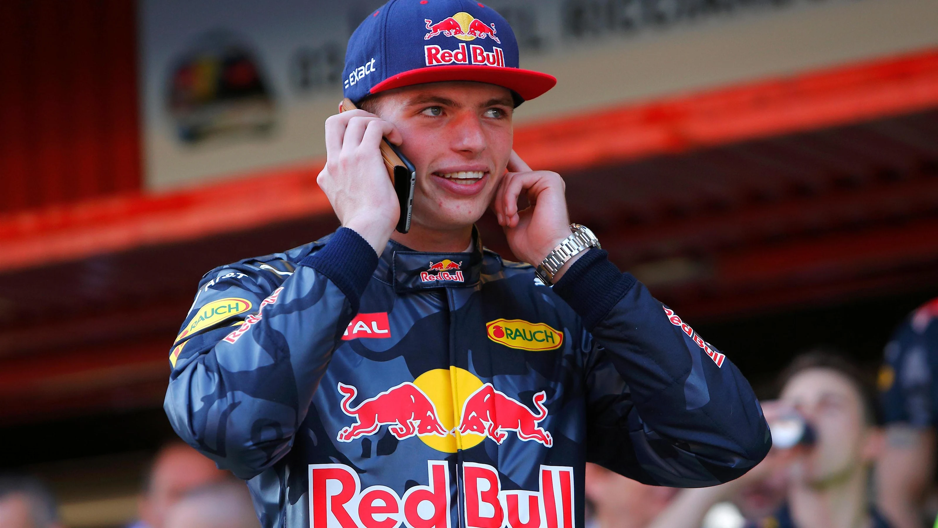 Race winner Max Verstappen (NED) Red Bull Racing celebrates with the team and phones home with the