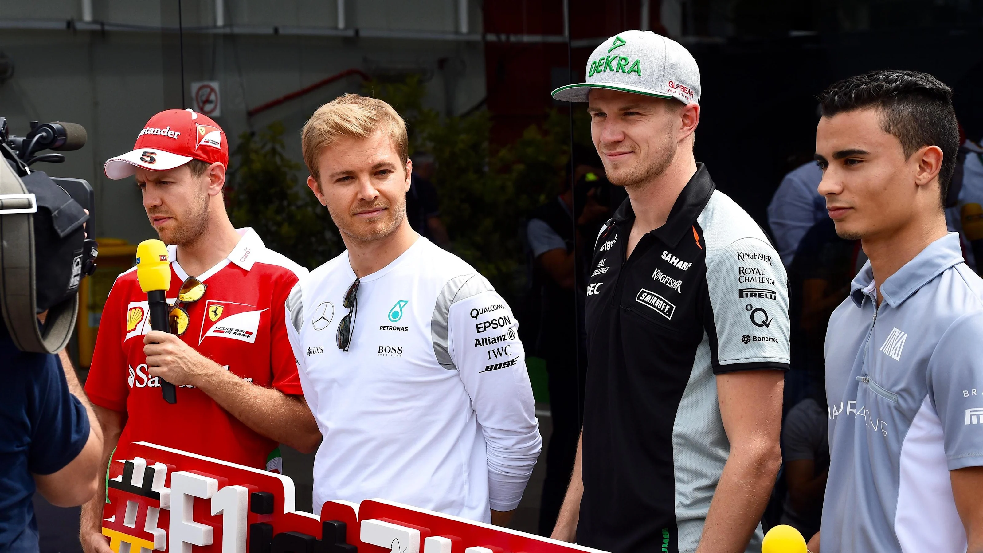 Sebastian Vettel (GER) Ferrari, Nico Rosberg (GER) Mercedes AMG F1, Nico Hulkenberg (GER) Force