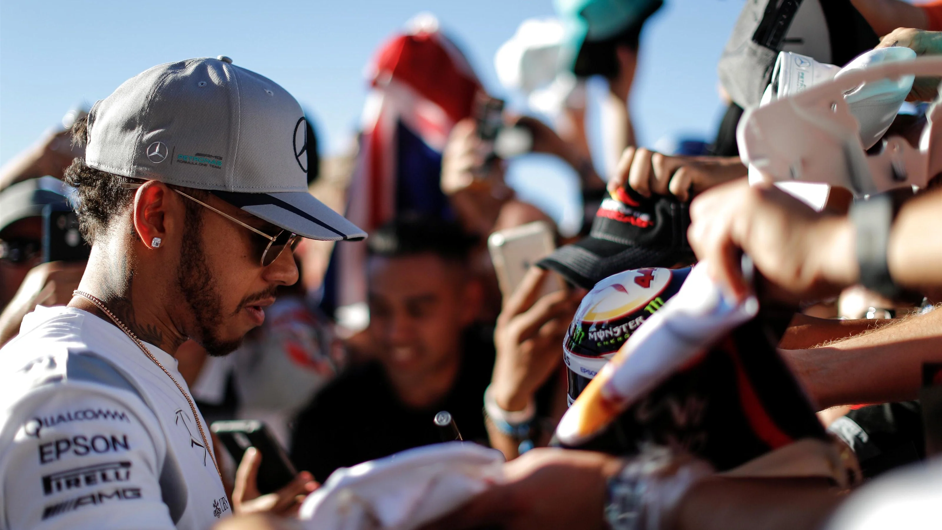 Lewis Hamilton (GBR) Mercedes AMG F1 signs autographs for the fans at Formula One World