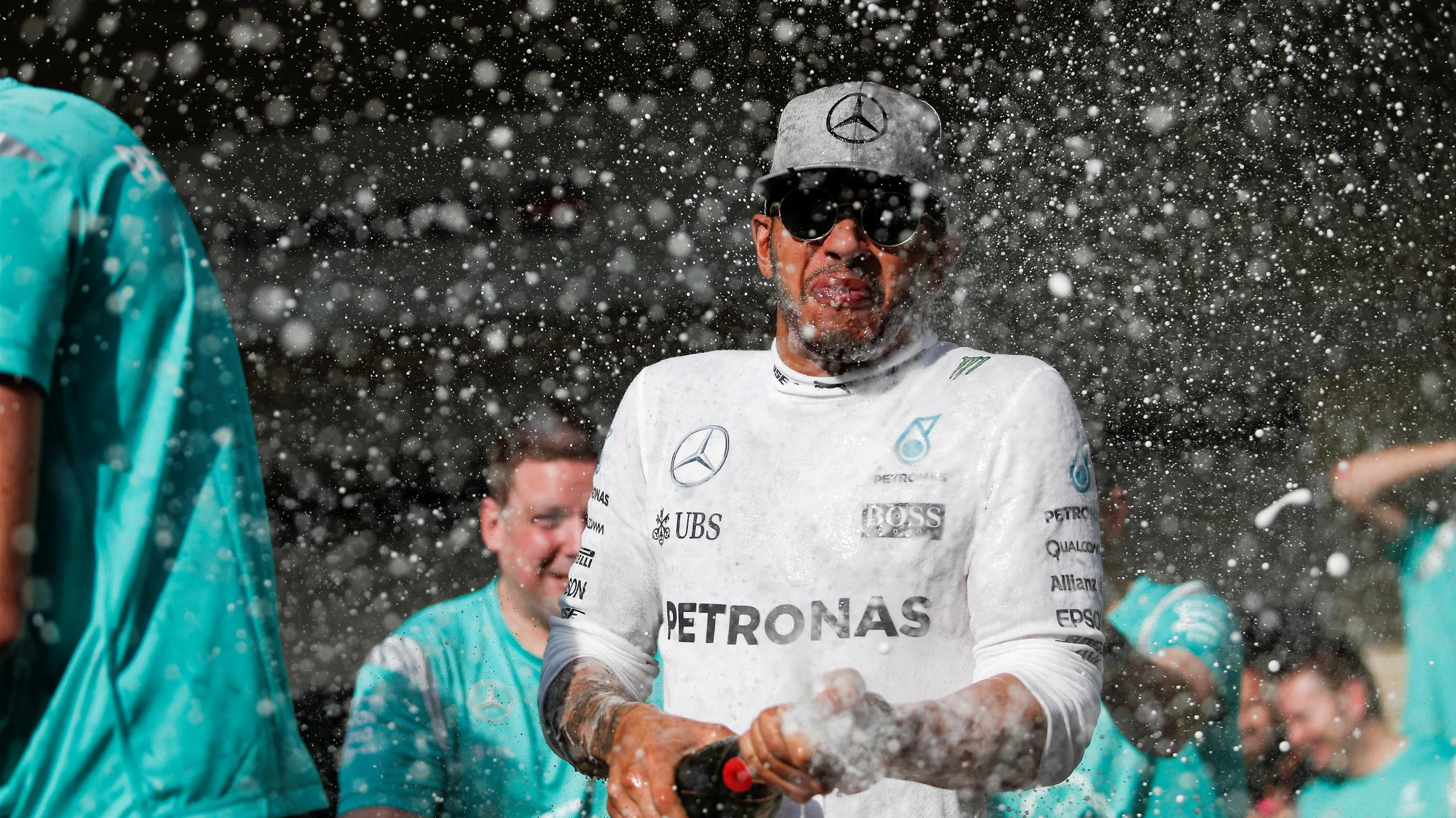 Race winner Lewis Hamilton (GBR) Mercedes AMG F1 celebrates with the team and the champagne at