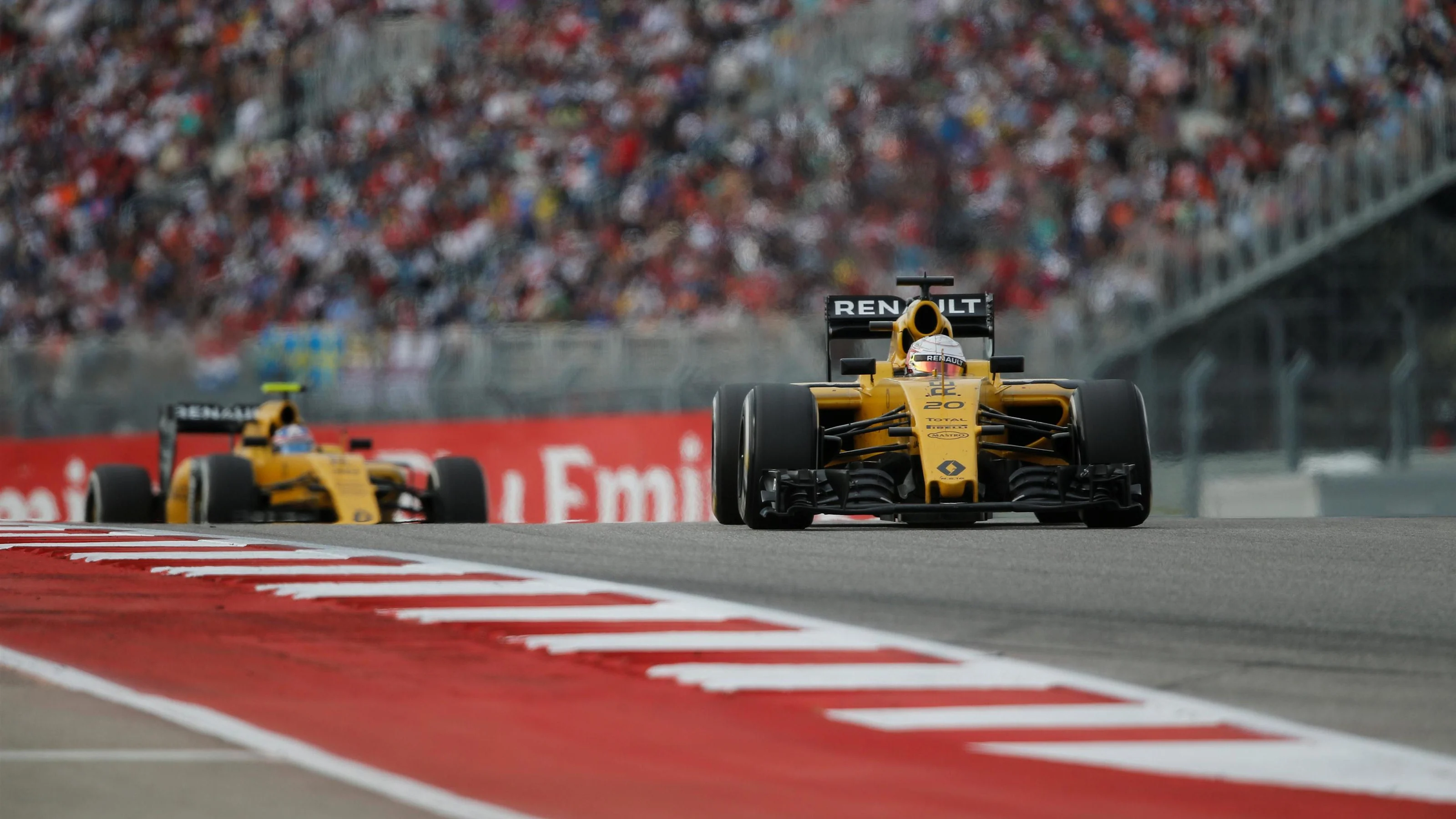 Kevin Magnussen (DEN) Renault Sport F1 Team RS16 leads Jolyon Palmer (GBR) Renault Sport F1 Team