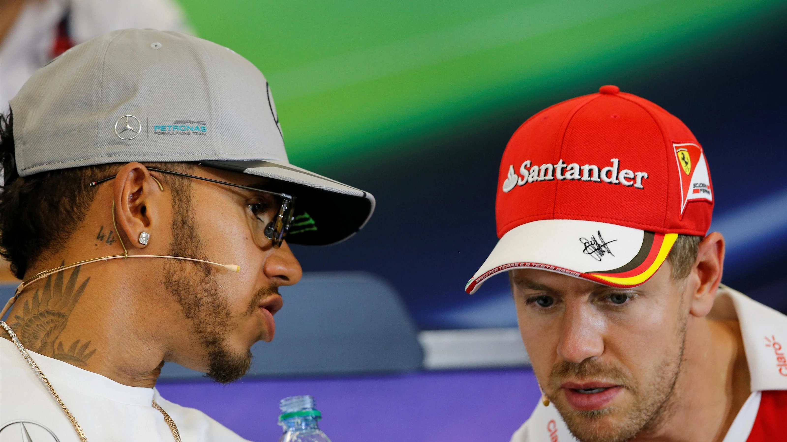 Lewis Hamilton (GBR) Mercedes AMG F1 and Sebastian Vettel (GER) Ferrari in the Press Conference at