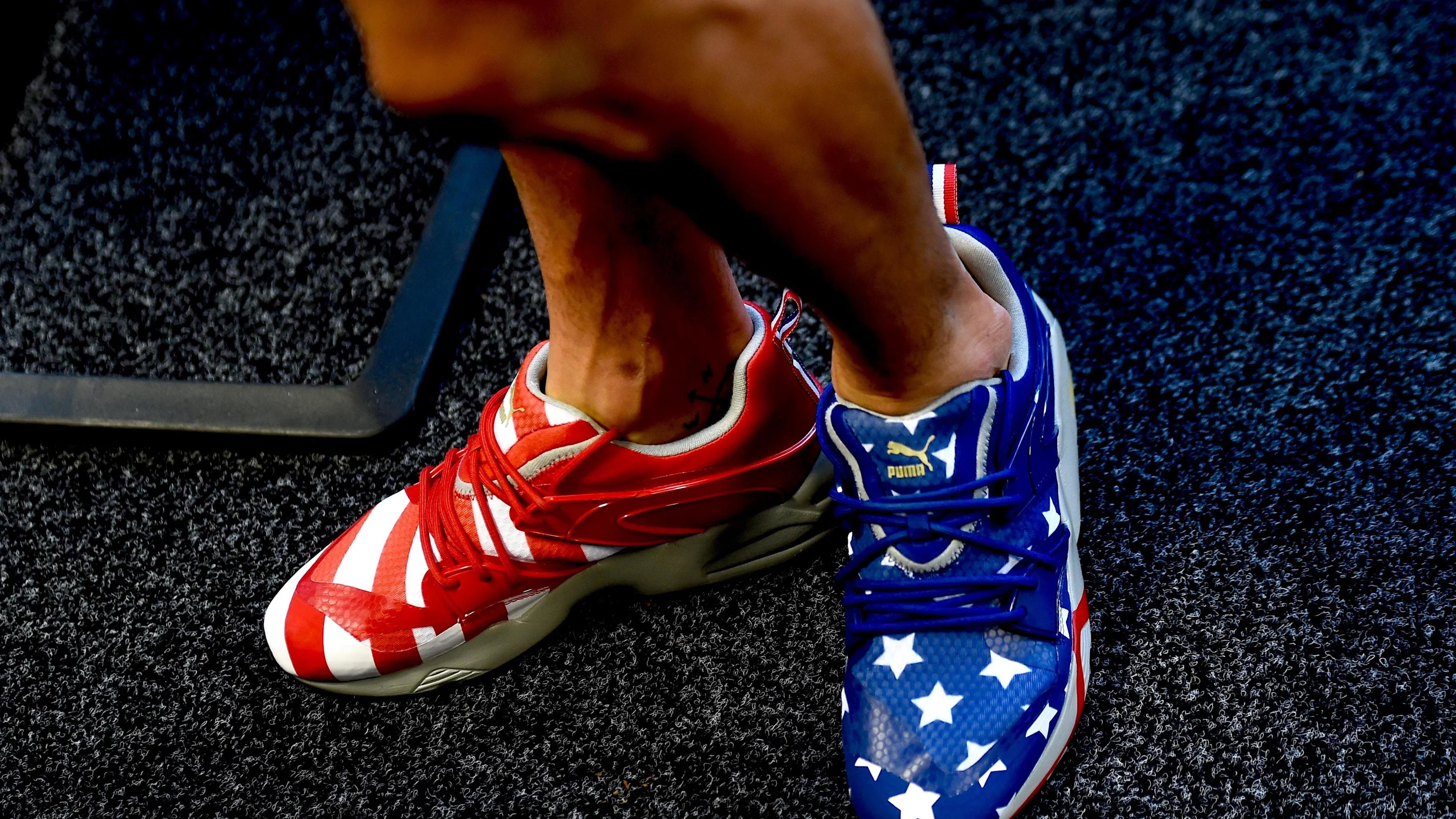 The shoes of Daniel Ricciardo (AUS) Red Bull Racing at Formula One World Championship, Rd18, United