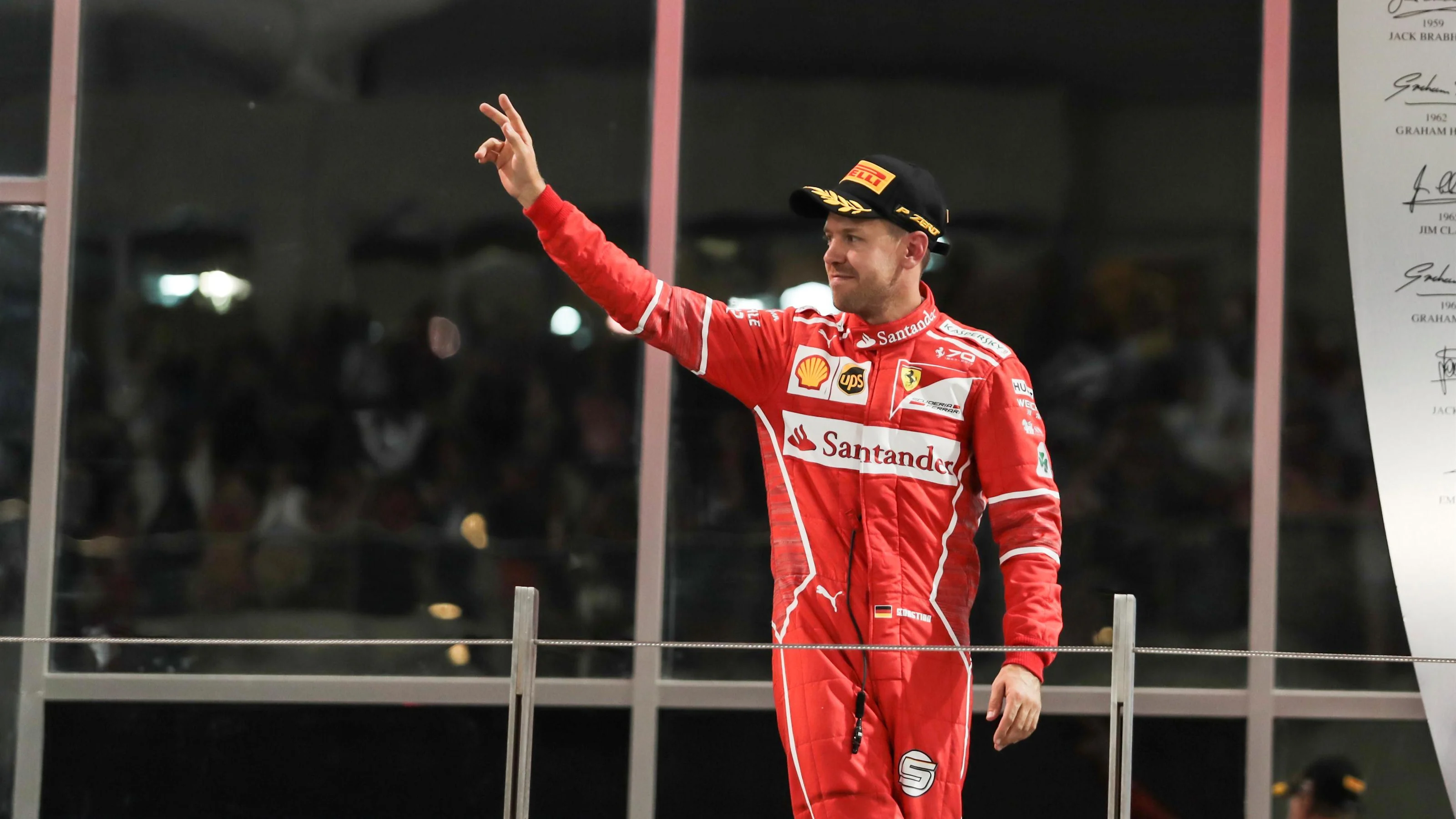 Sebastian Vettel (GER) Ferrari celebrates on the podium at Formula One World Championship, Rd20,