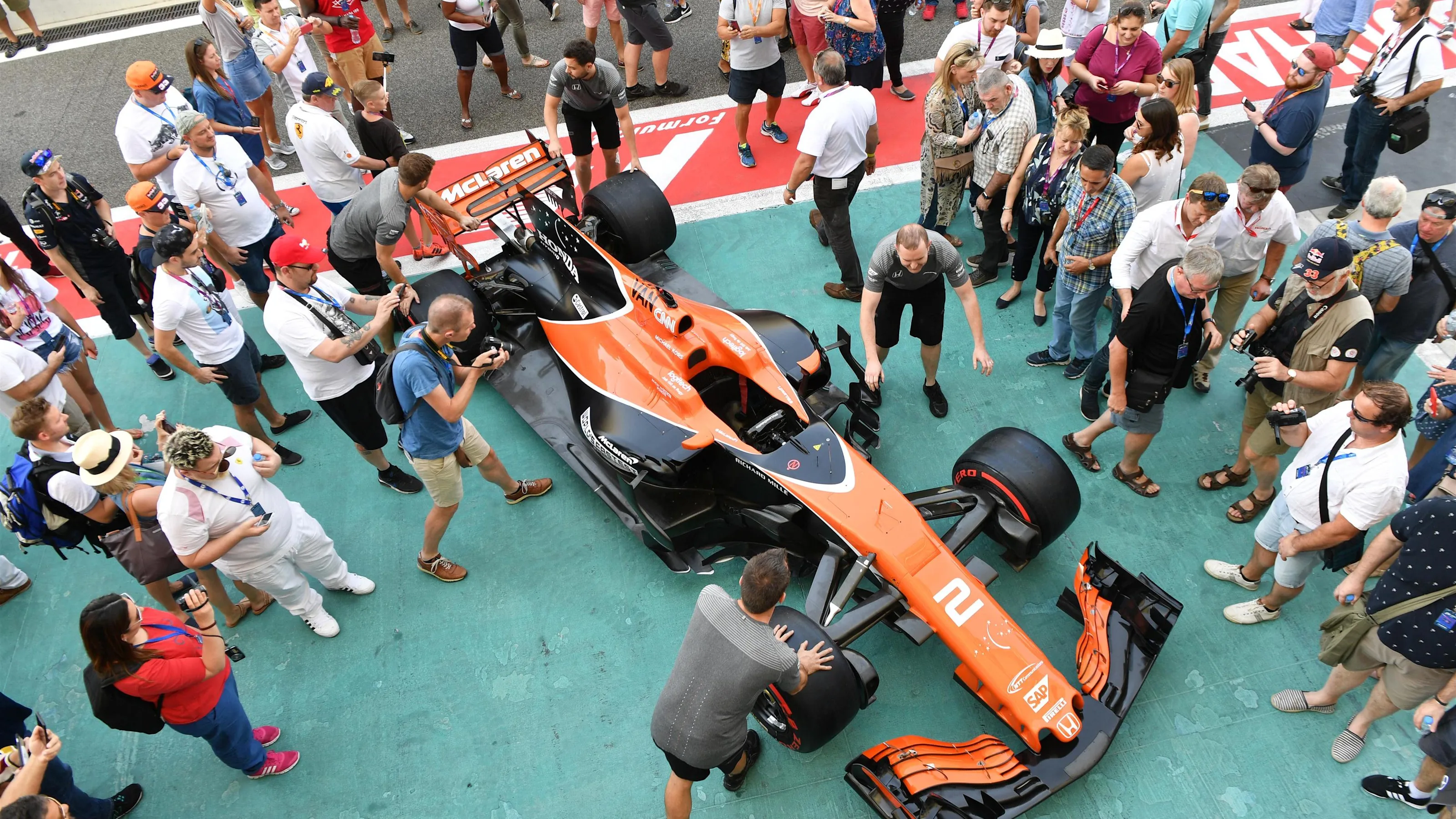 McLaren MCL32 and fans in pit lane at Formula One World Championship, Rd20, Abu Dhabi Grand Prix,