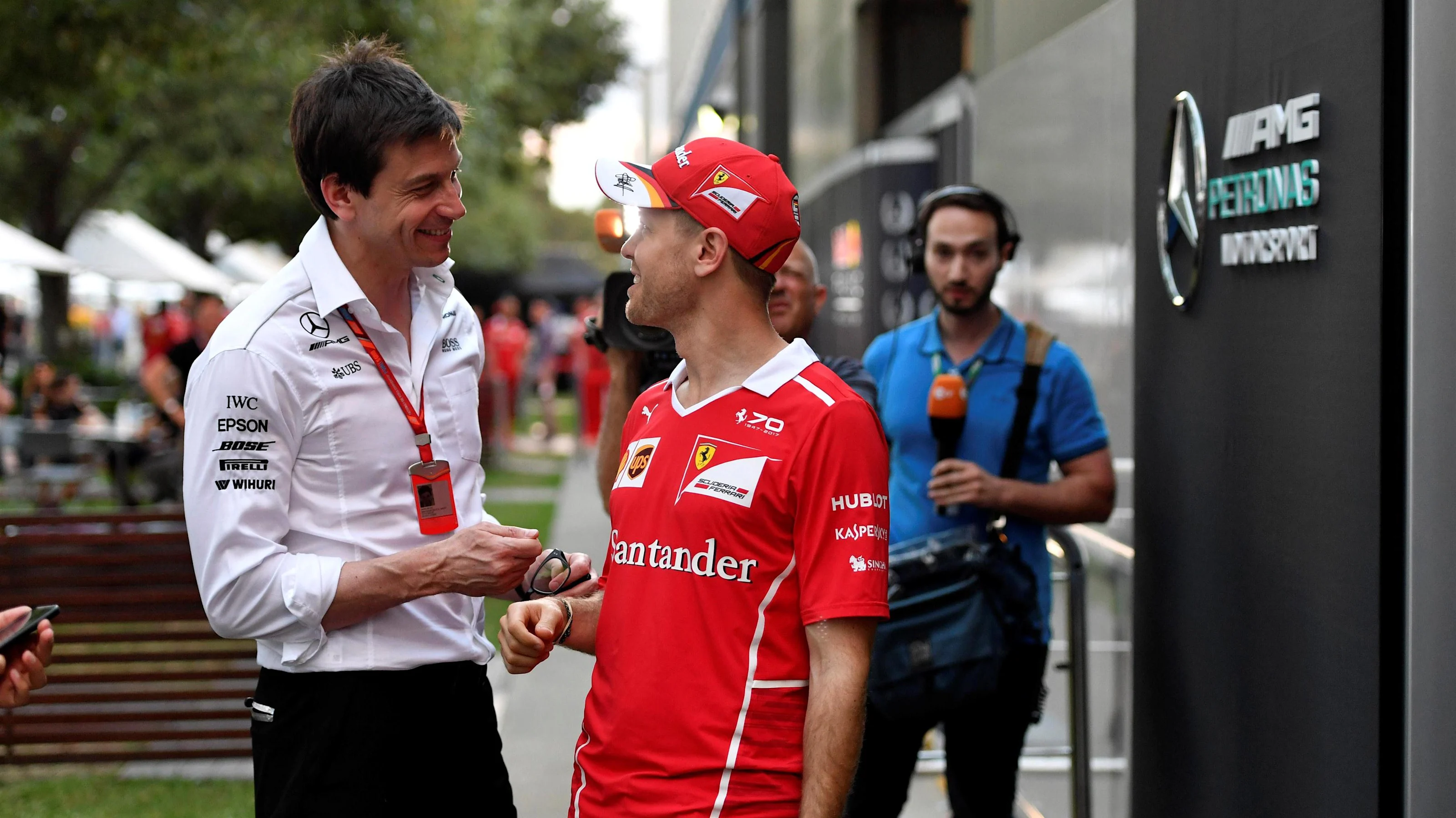 Toto Wolff (AUT) Mercedes AMG F1 Director of Motorsport and Sebastian Vettel (GER) Ferrari at