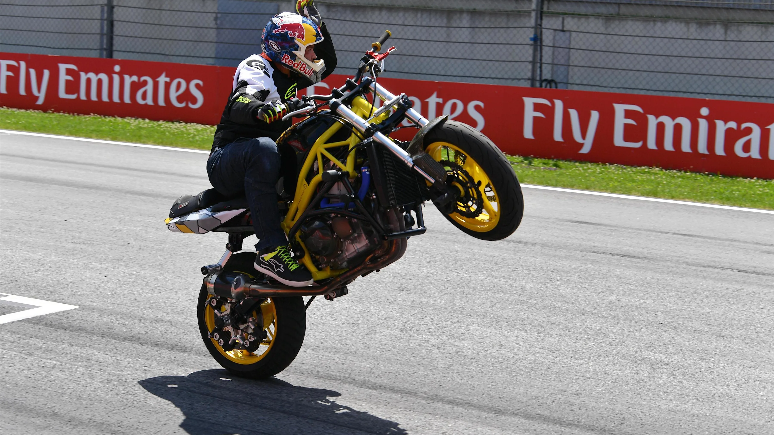 Motorbike stunt rider at Formula One World Championship, Rd9, Austrian Grand Prix, Practice,