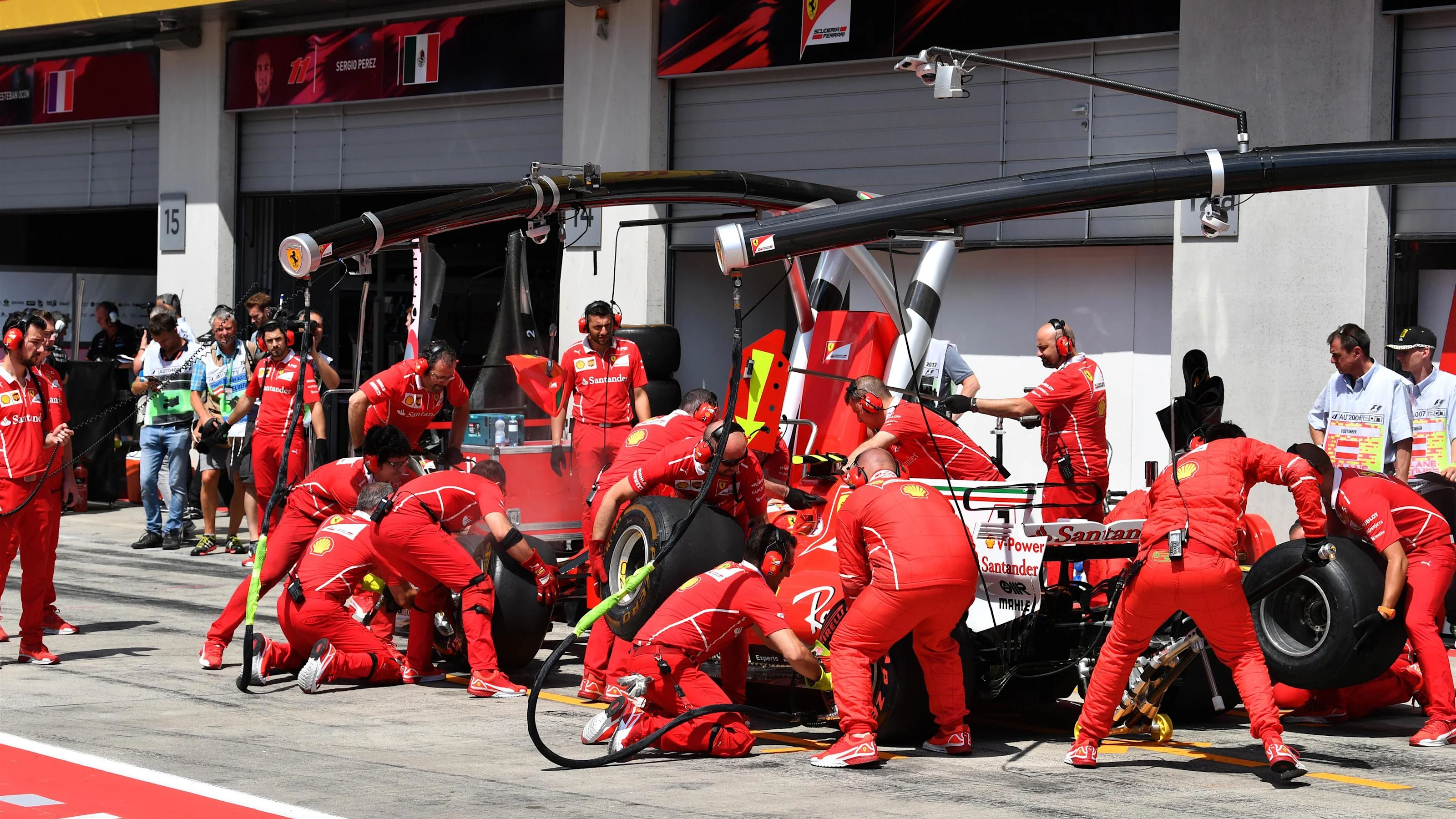 Kimi Raikkonen (FIN) Ferrari SF70-H pit stop at Formula One World Championship, Rd9, Austrian Grand
