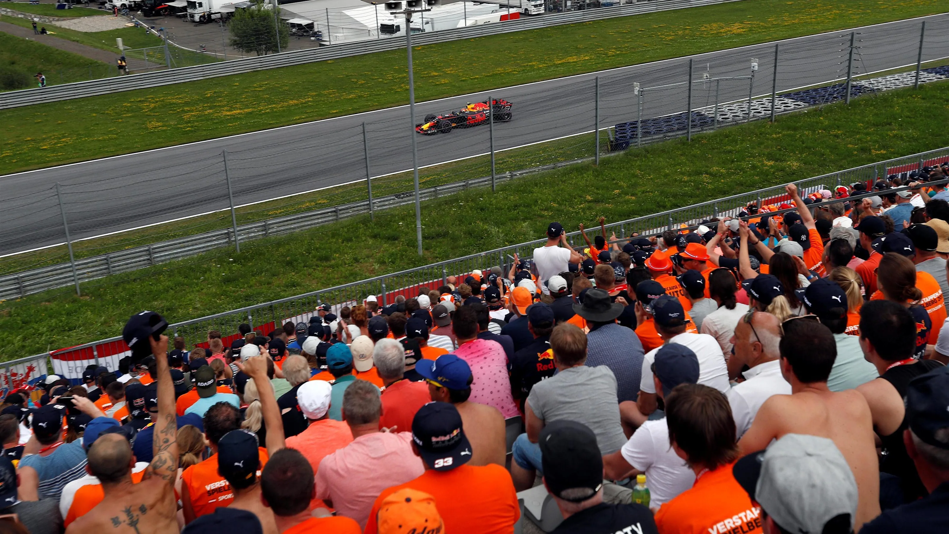 Max Verstappen (NED) Red Bull Racing RB13 and fans and atmosphere in the grandstand at Formula One