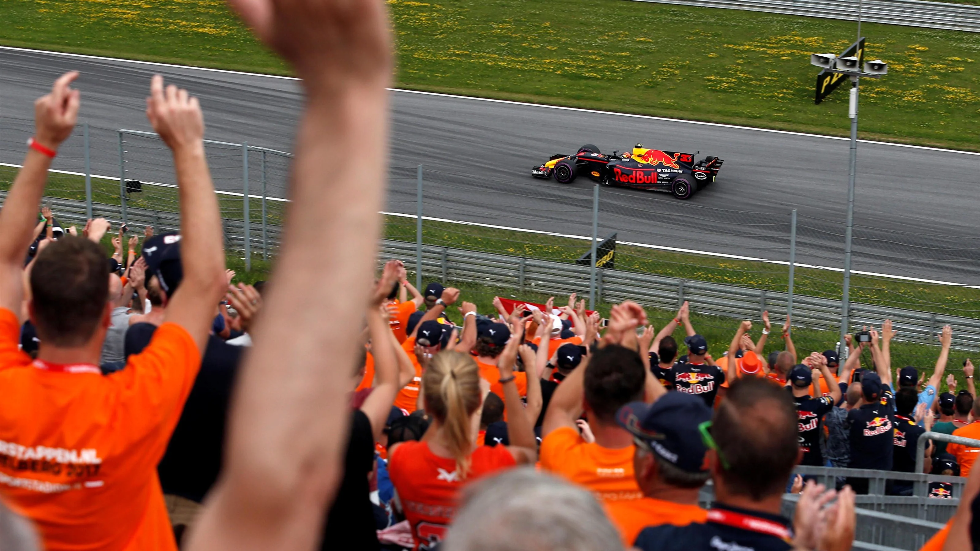 Max Verstappen (NED) Red Bull Racing RB13 passes his fans in the grandstand at Formula One World