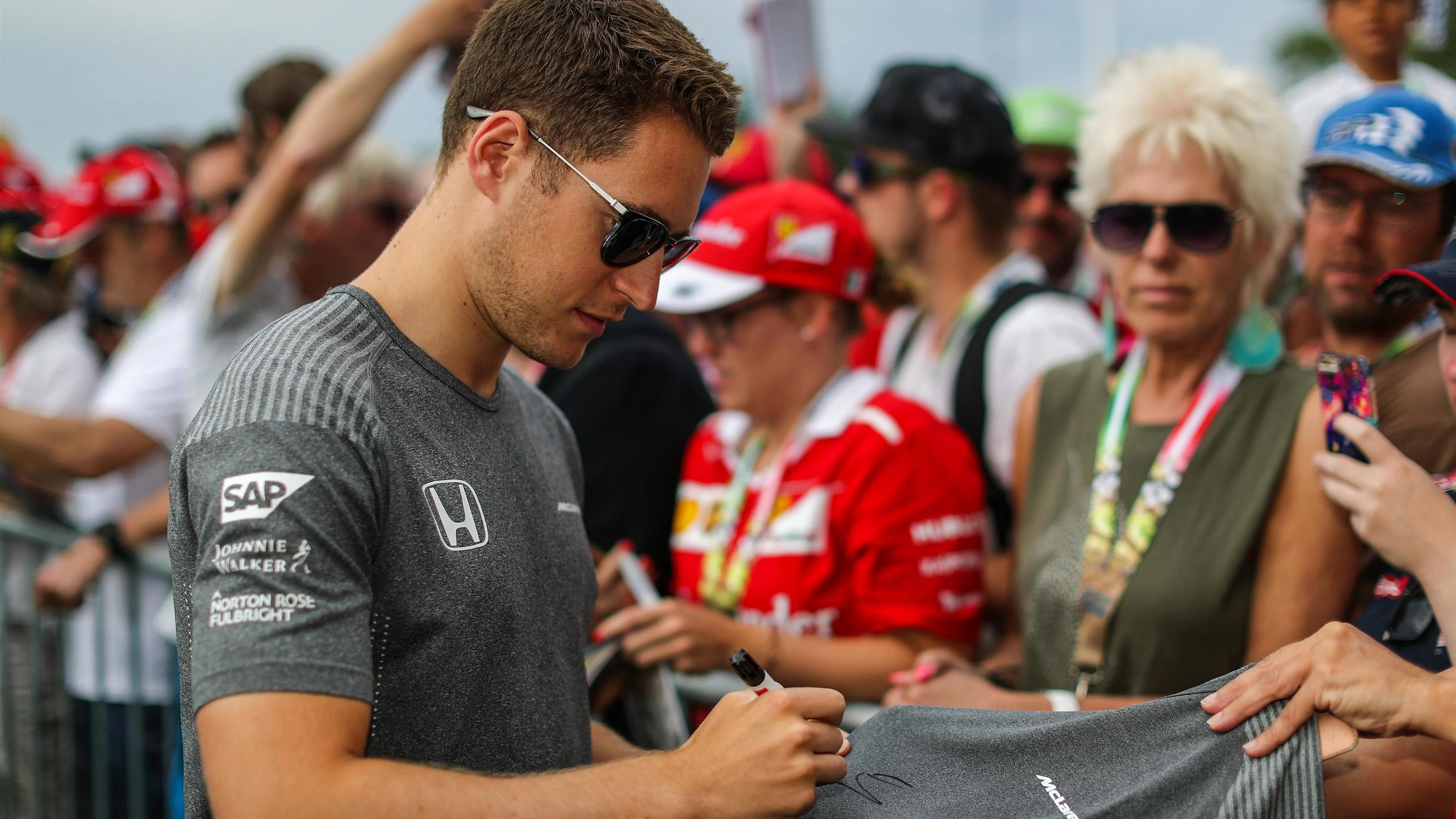 Stoffel Vandoorne (BEL) McLaren signs autographs for the fans at Formula One World Championship,