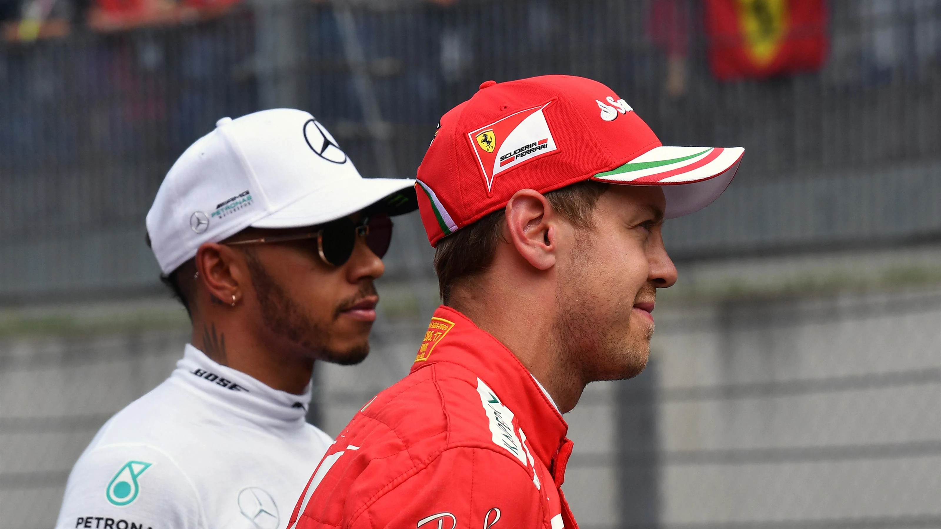 Lewis Hamilton (GBR) Mercedes AMG F1 and Sebastian Vettel (GER) Ferrari after Qualifying at Formula