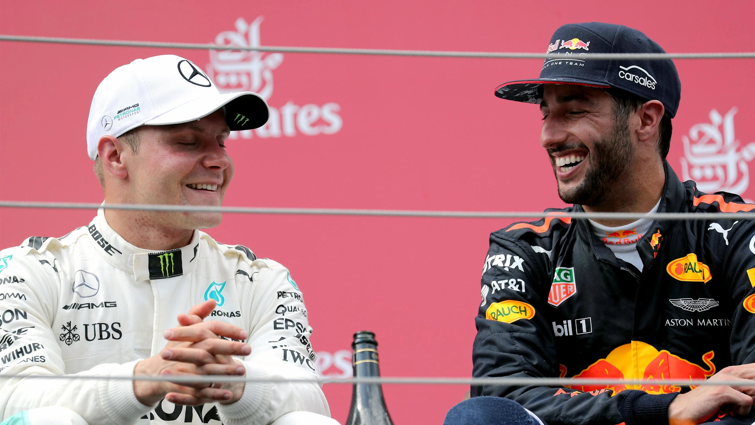 Race winner Valtteri Bottas (FIN) Mercedes AMG F1 celebrates on the podium with Daniel Ricciardo