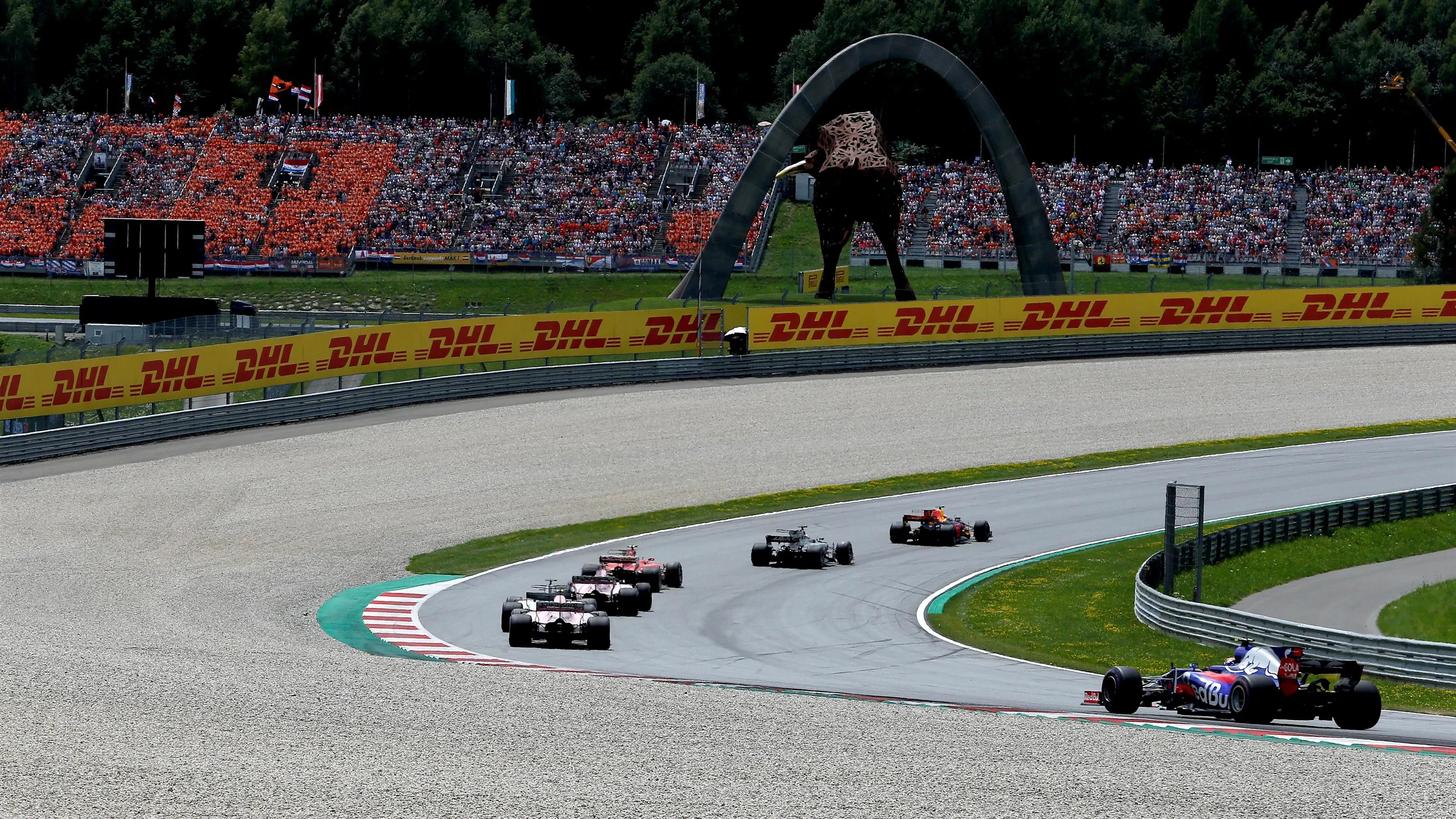 Lap one action at Formula One World Championship, Rd9, Austrian Grand Prix, Race, Spielberg,